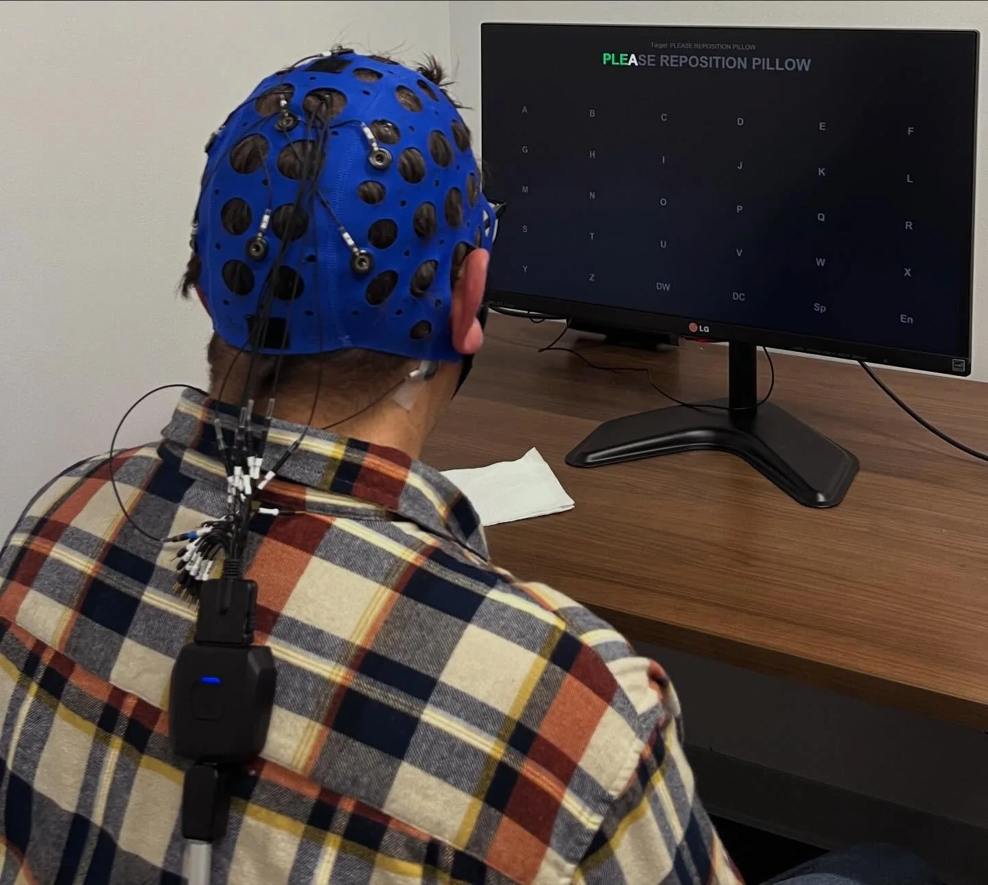 Our executive director, Jamey traded in his director cap to become a BCI research participant! Here he is testing out our P300 System. This system allows patients to communicate using their very own brain waves! 🧠 🔬 See the link in our bio, or copy