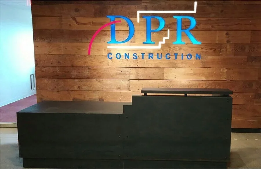DPR+Reception+Desk+and+Signage.webp