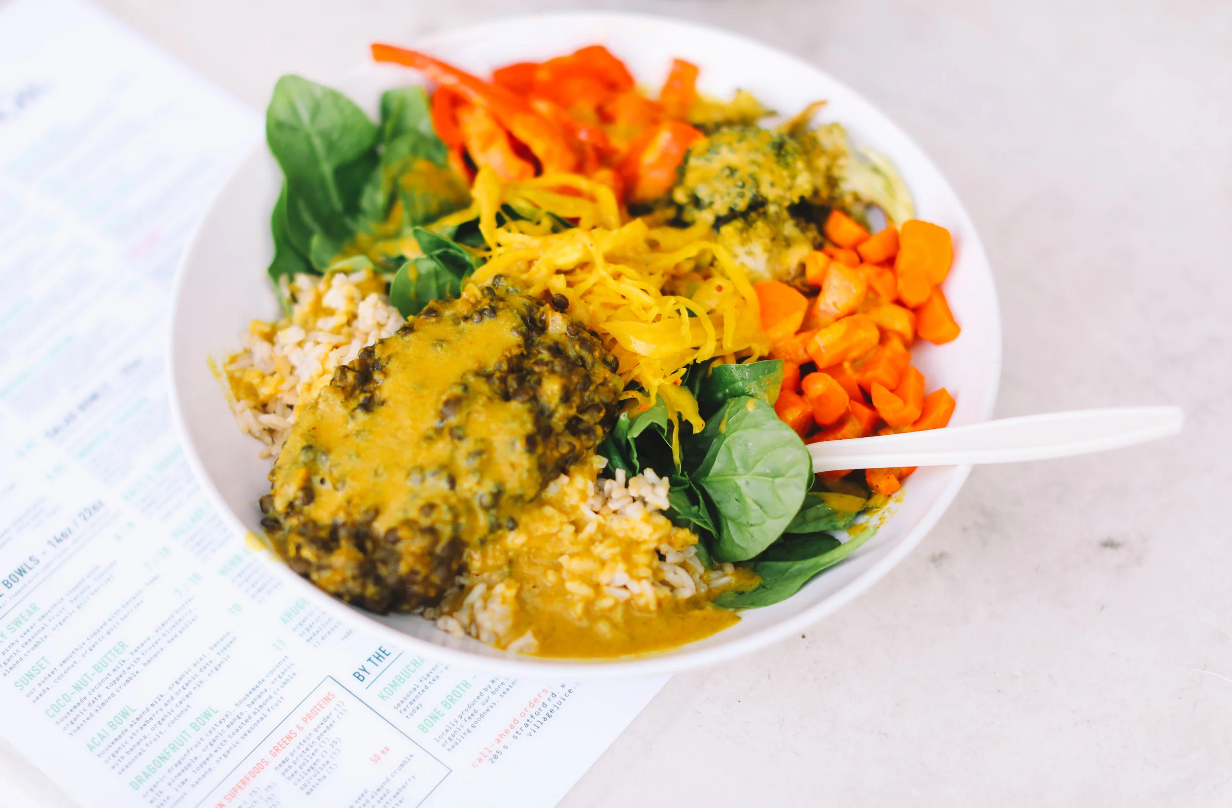 CURRENTLY OUT OF SEASON ~ COCONUT CURRY BOWL: organic spinach ~ brown rice ~ organic roasted broccoli ~ organic roasted carrot ~ organic roasted red pepper ~curried black lentils ~ gnomestead hollow curry kraut || dressing: young coconut curry sauce || $11.00 