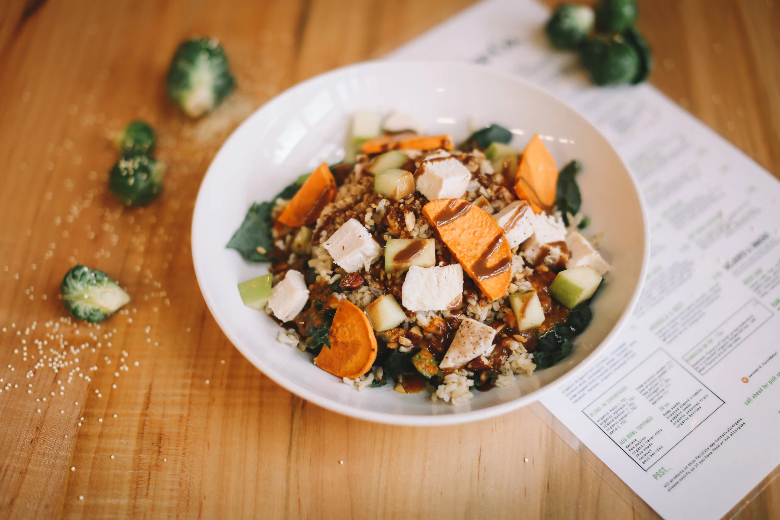 FARMERS DAUGHTER: organic spinach or kale ~ brown rice ~ organic roasted sweet potato ~ spiced almonds ~ organic green apples ~ Joyce Farms chicken breast || dressings: balsamic dijon & roasted carrot || $9.95 * suggested add-ons: avocado, fried egg, white cheddar