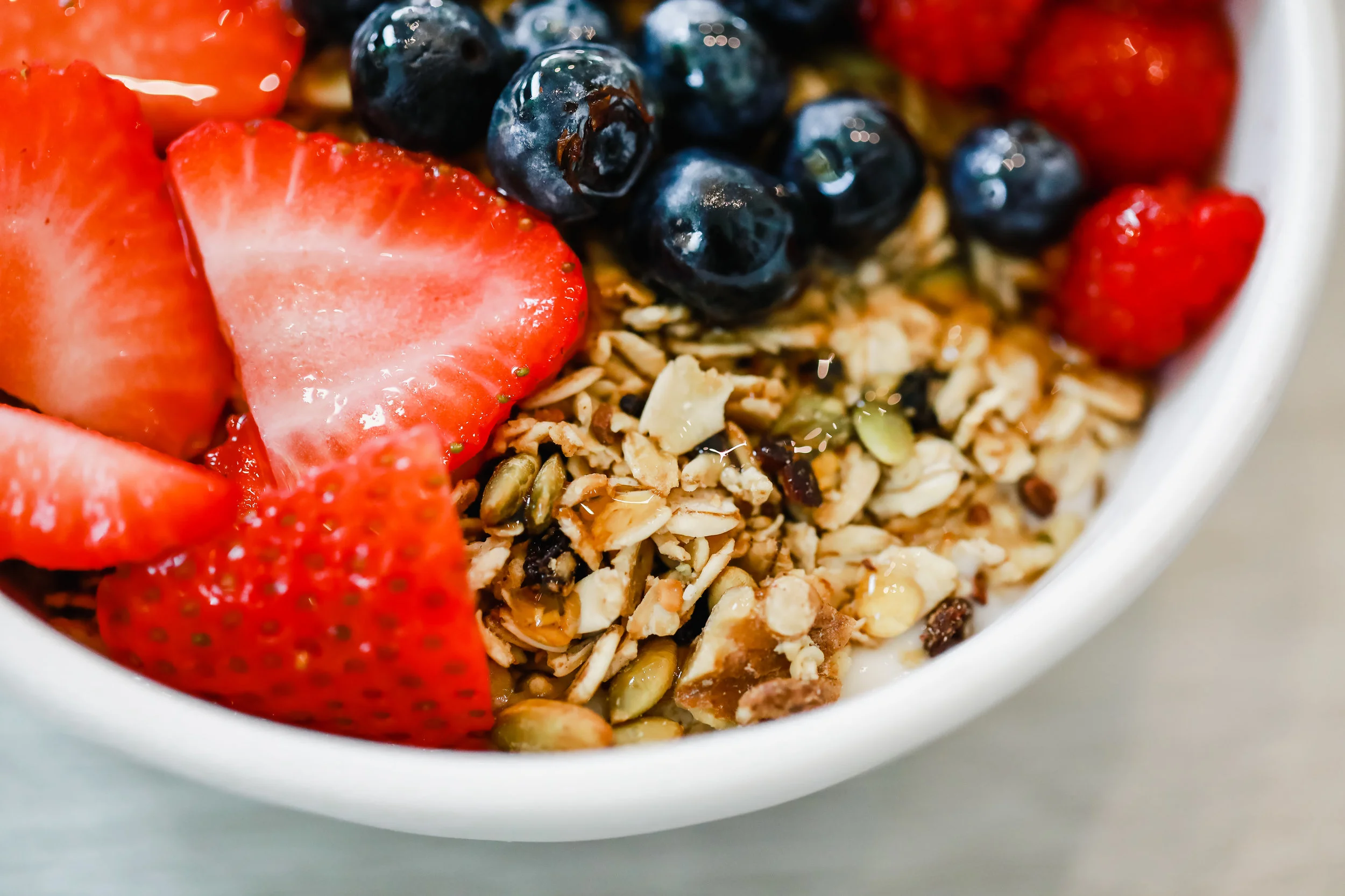 Our Granola Girl yogurt bowl drizzled with G-Money Honey Photo: Lindley Battle Photography