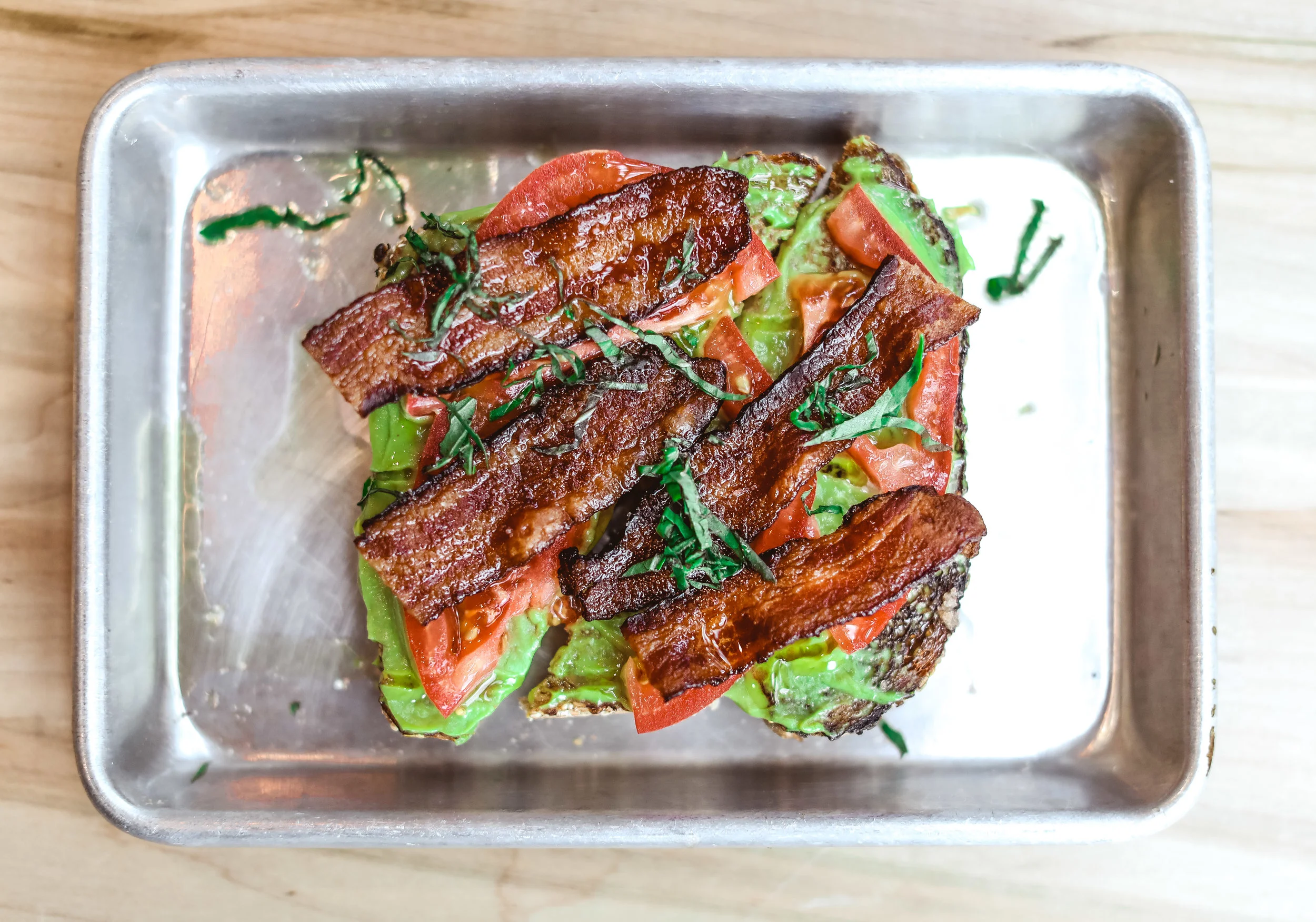 Our mouthwatering Basil, Bacon, & Tomato toast Lindley Battle Photography