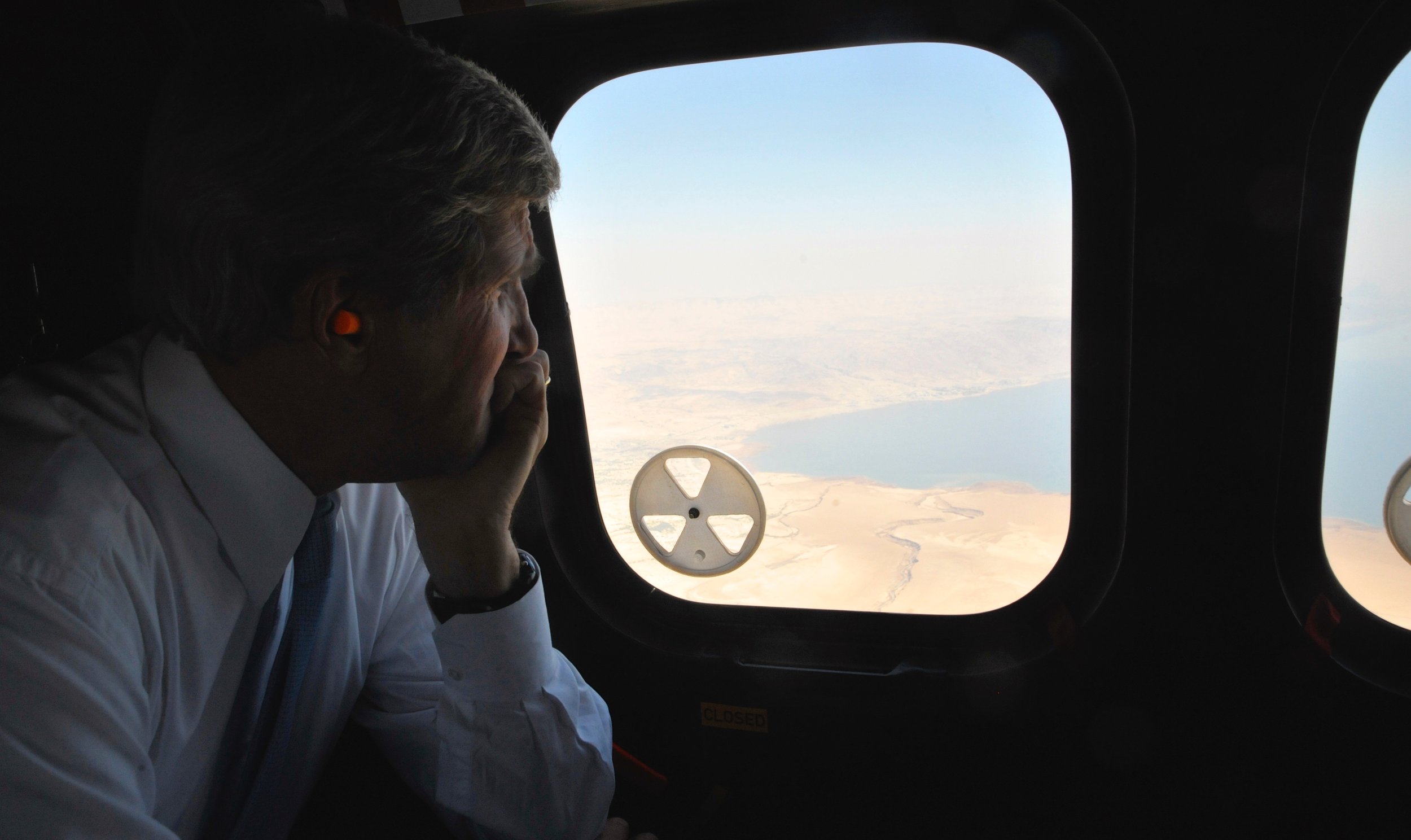  Secretary Kerry looking out at the Dead Sea during one flight between Jordan and Israel. 