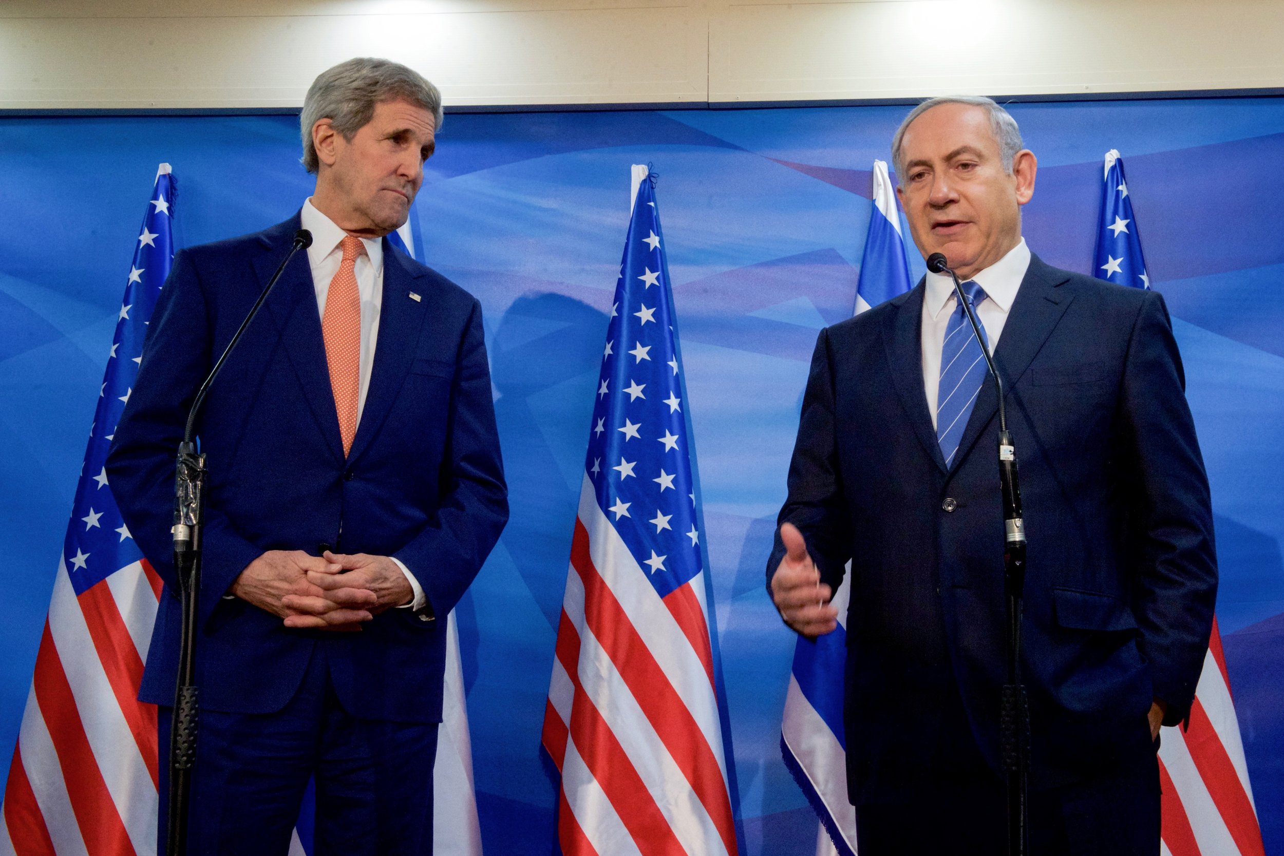  Secretary Kerry listening as Prime Minister Netanyahu addresses reporters outside his office in Jerusalem. 