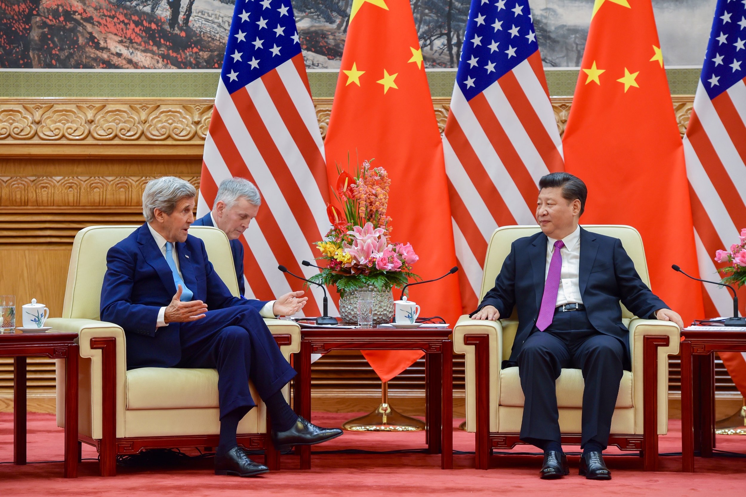 Secretary Kerry speaks with President Xi in a meeting room at the Great Hall of the People.