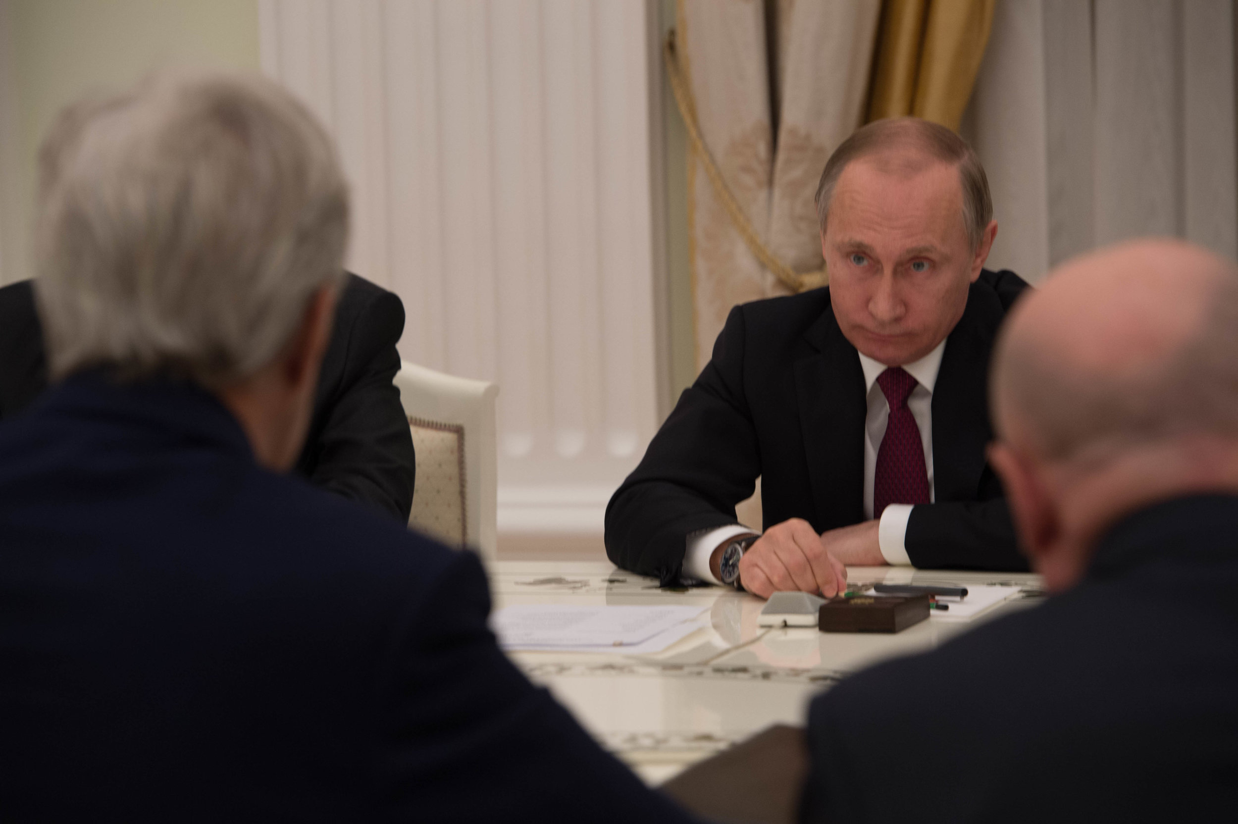  President Putin, a former KGB agent, betrays no emotion during his negotiations. 