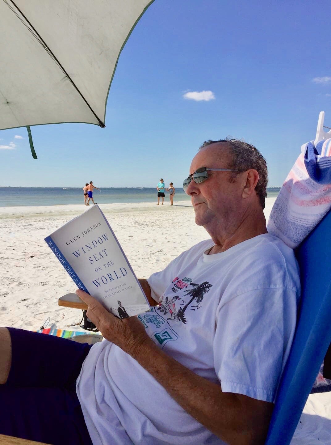  Former UMass Professor Frank Talty reads WSOTW on the beach in Fort Myers, Fla. 