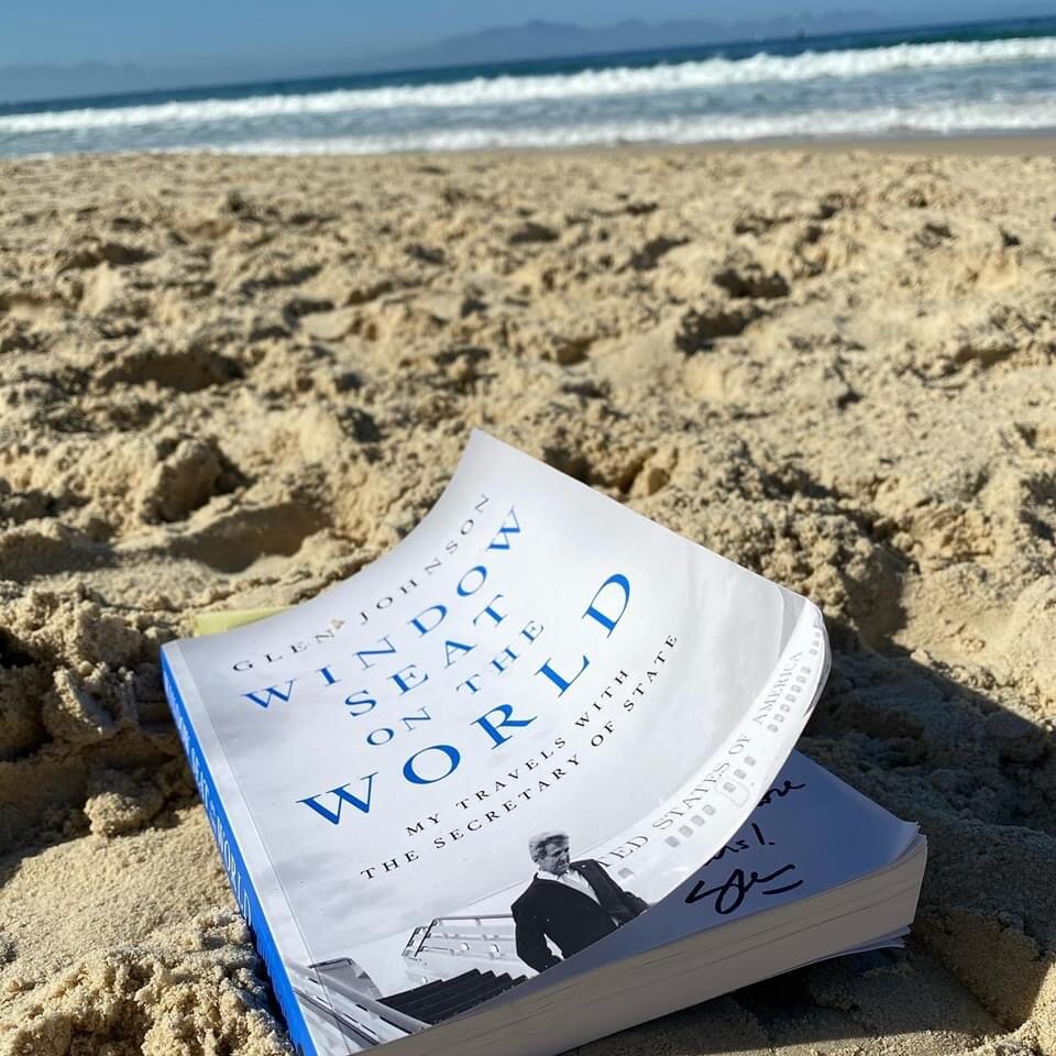  Foreign Service wife and SuperMom Jennie LaBranche finishes the book at Glencairn Beach in Capetown, South Africa. 