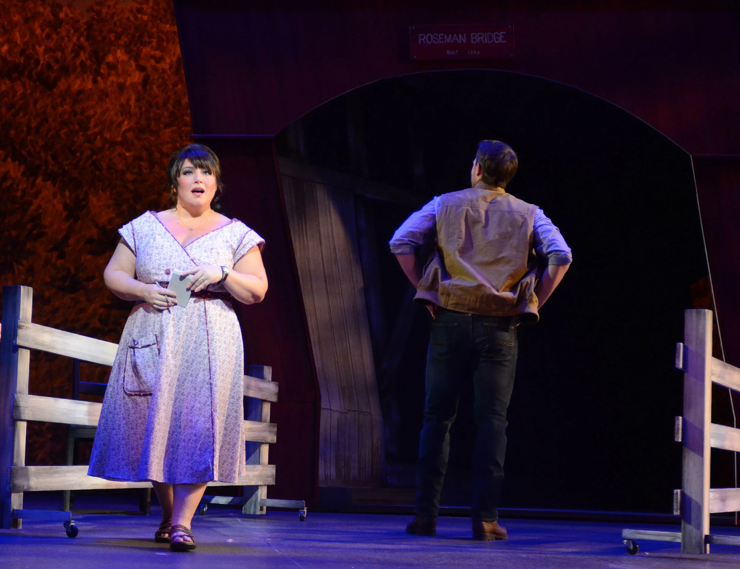 Francesca (Cassandra Klaphake) and Robert (Bryant Martin) at the Roseman bridge in Arizona Broadway Theatre's production of The Bridges of Madison County.JPG