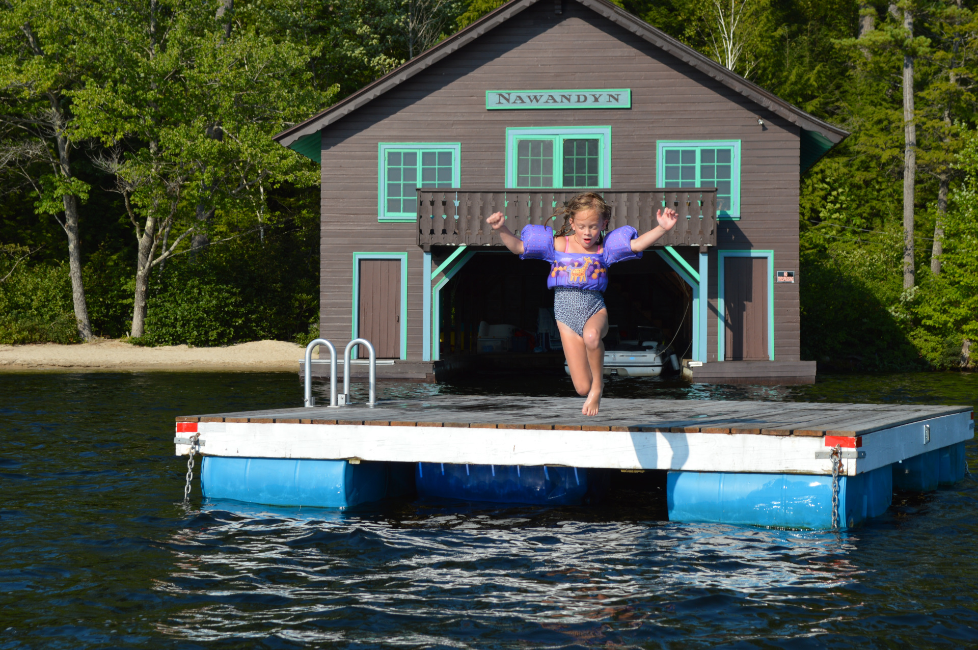 Joy!  Jump from Nawandyn's Swim Raft into Warm, Clear Water