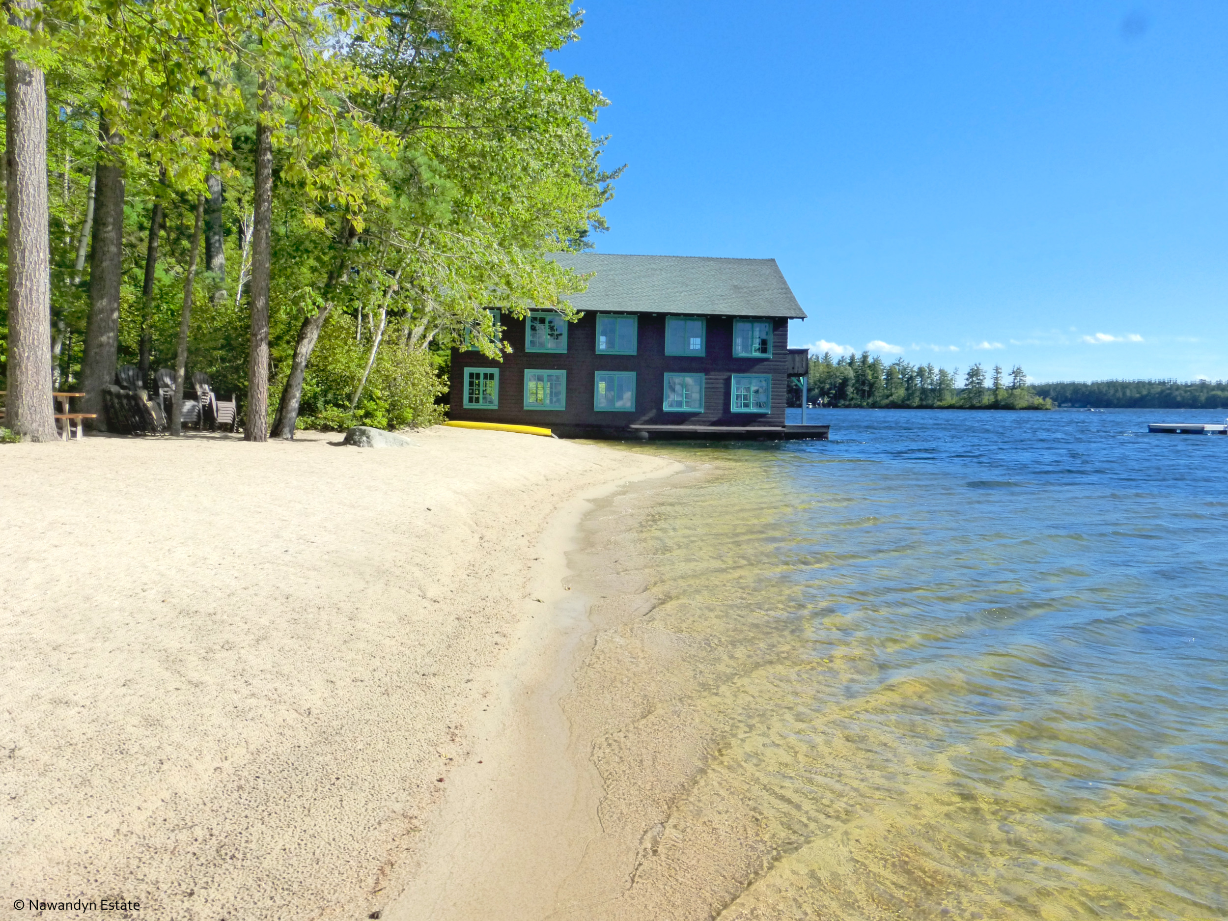 Private long sandy beach abuts Nawandyn Estate's boathouse