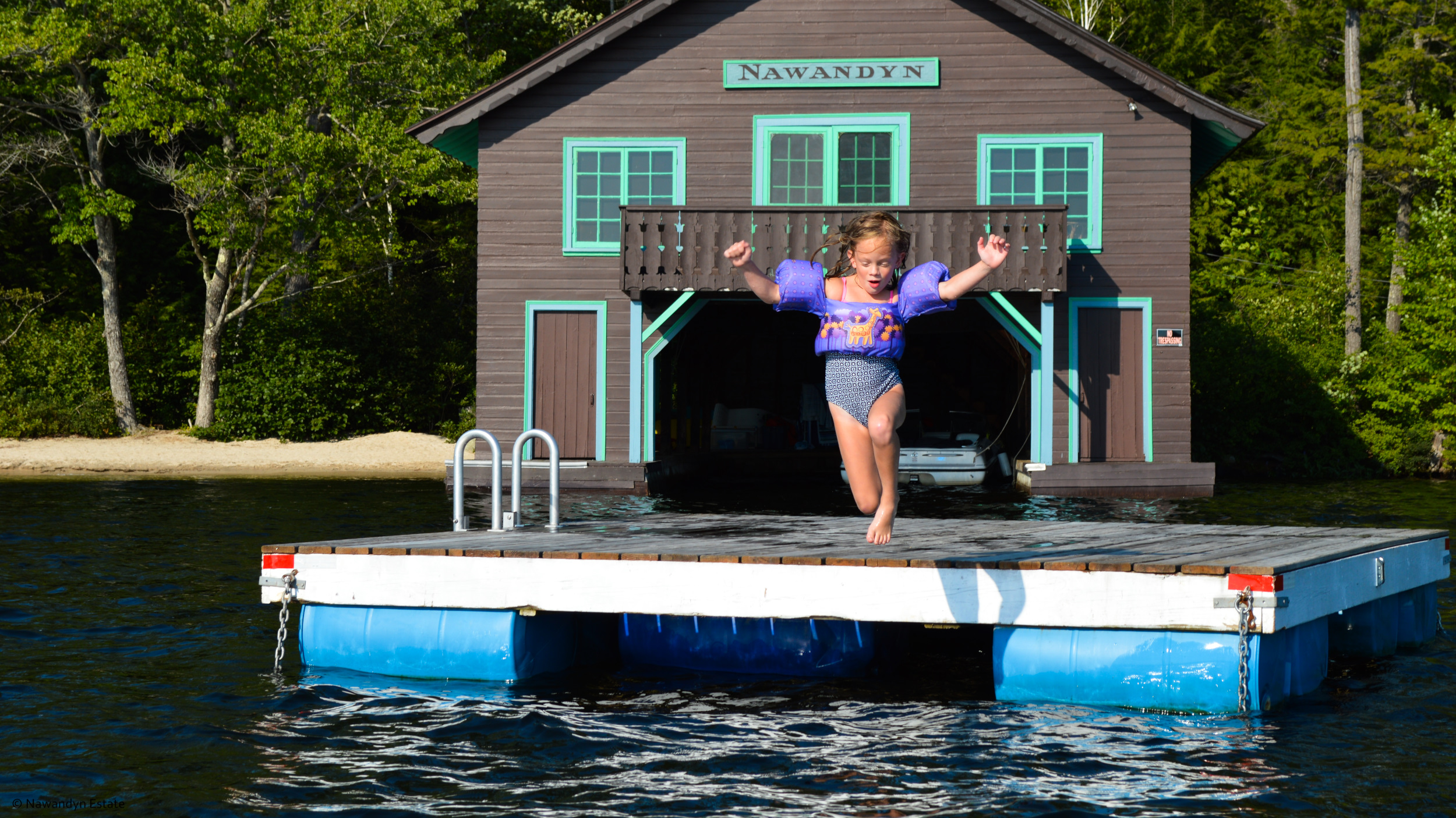 Sheer Joy -- jumping into warm, clear Highland Lake