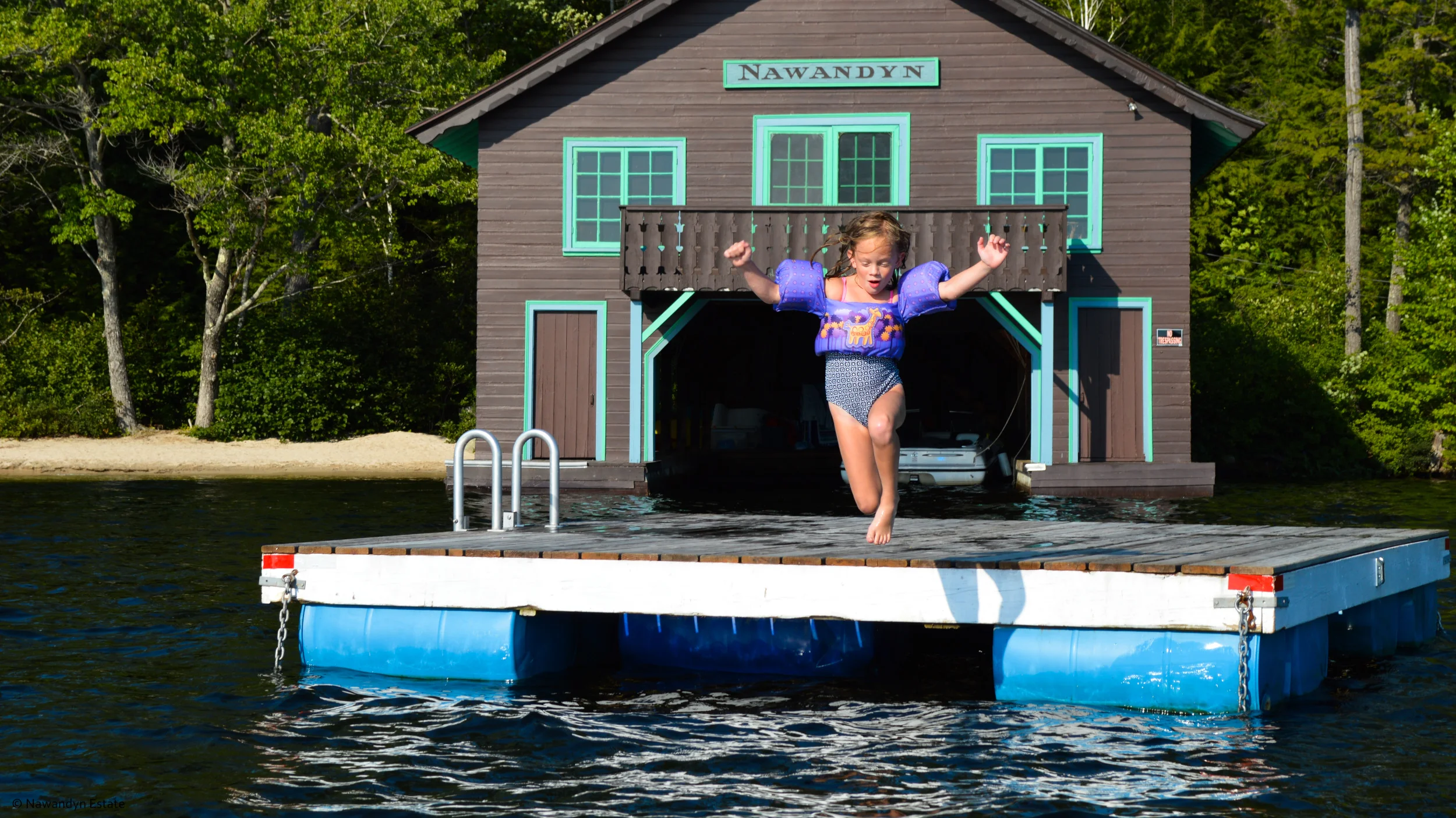 Sheer Joy -- jumping into warm, clear Highland Lake