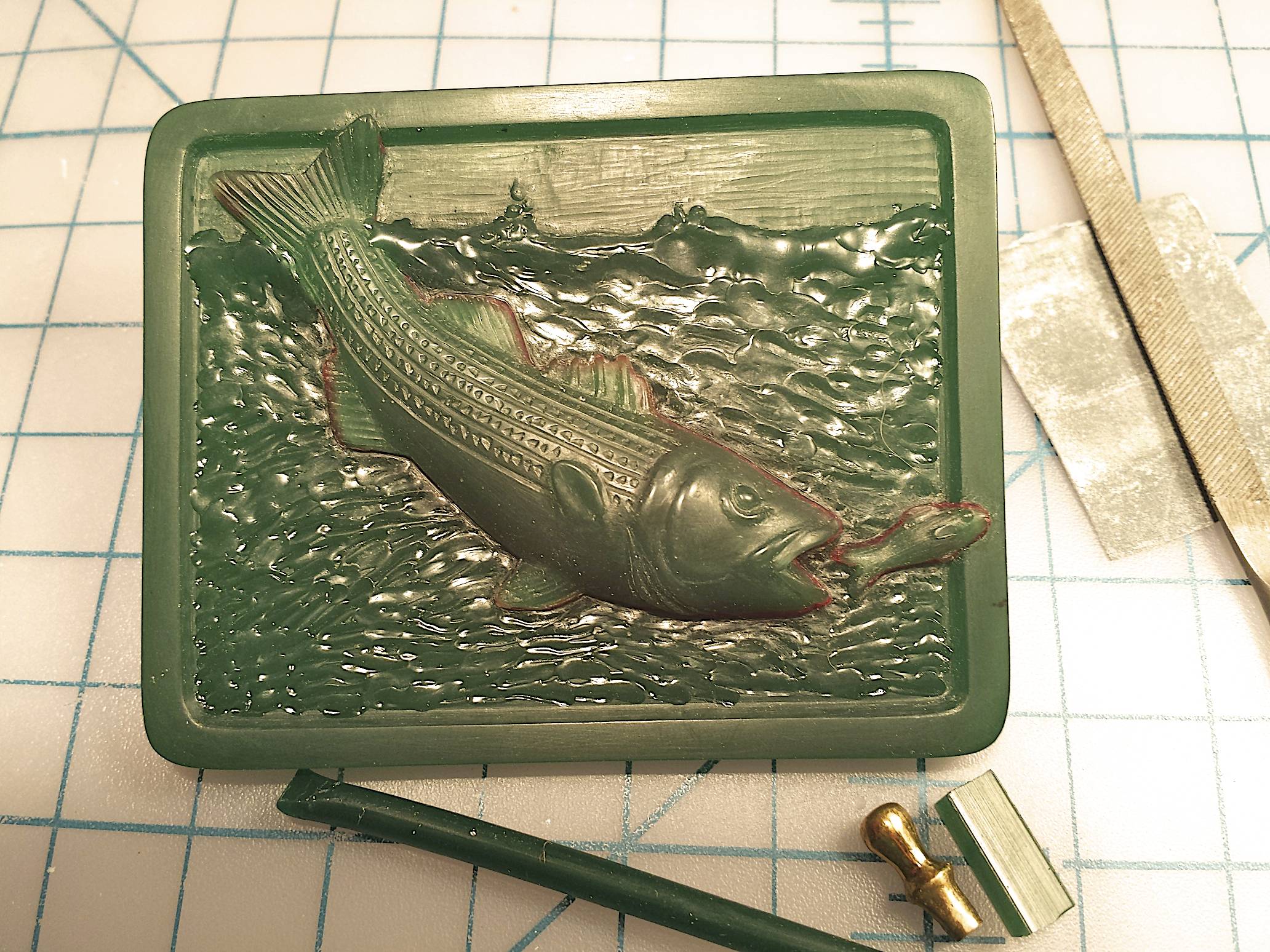 Adding the water, tops of the waves and the bait fish.