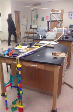 Physical Science: The assignment, Marble in Motion, using a marble and any materials from home or in class–Construct a model to demonstrate all 3 laws of motion, 3 forms of friction, and a change in velocity. This was an awesome hands on approach. My students had a fun time with it!