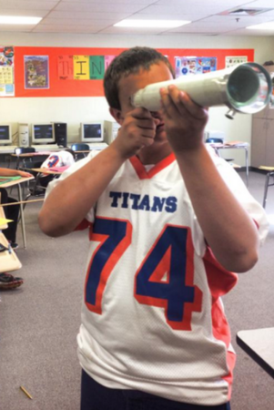 She barely has any funding, but rounded up enough to make home-made telescopes for her 8th graders!