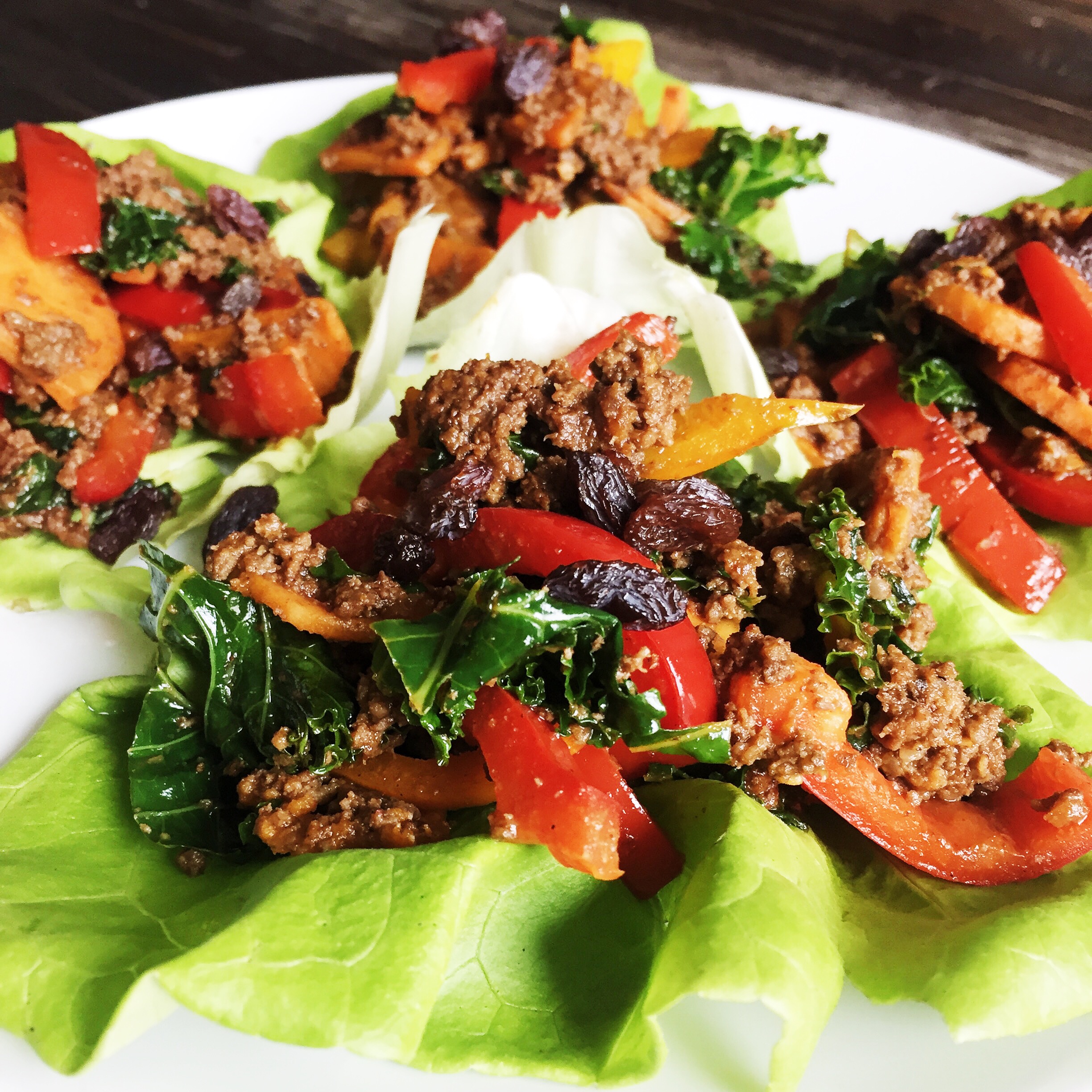 Lettuce wraps. I stir fried some of my chopped veggies with my emergency protein and topped with raisins. Voila! lunch is ready!