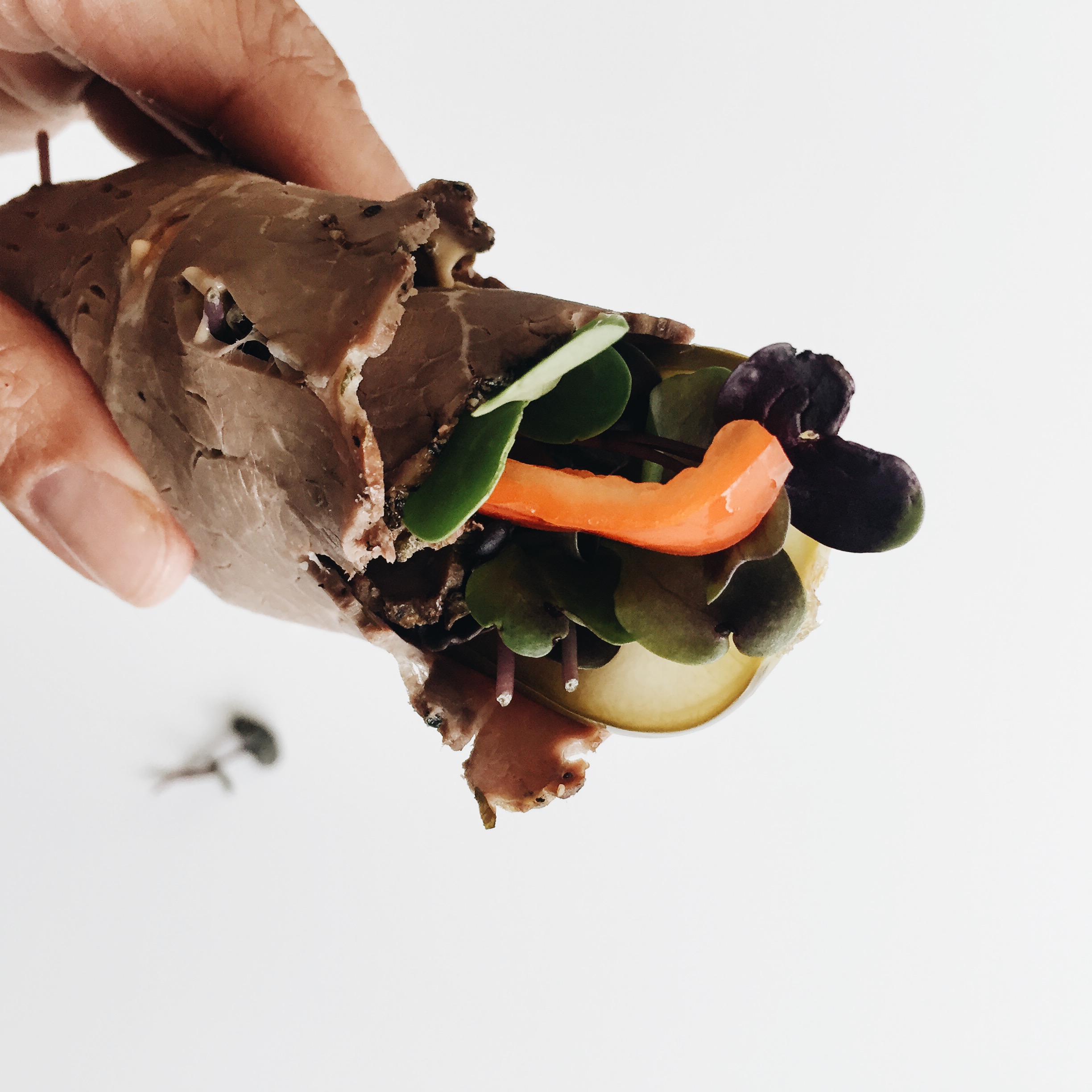 Details: roast beef, micro mix, organic kosher pickle, red paper, and mustard. 