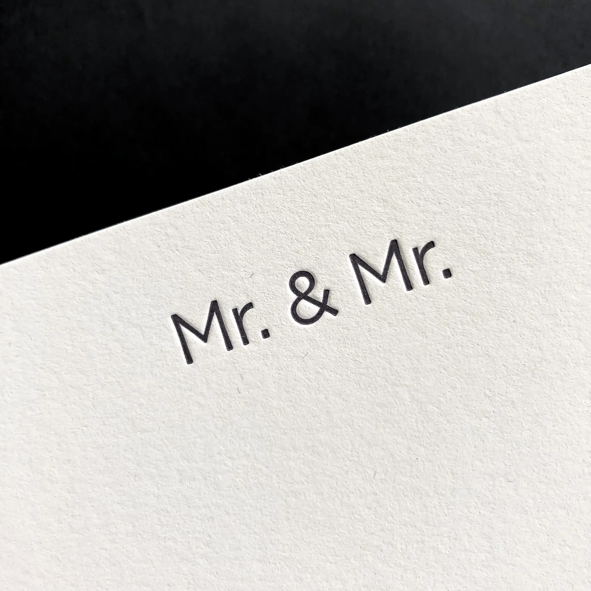 TypeA-Invitations_NewlywedLetterpressStationerySet_MrAndMr_LightGreyCard_LetterpressDetailCloseUp.jpg