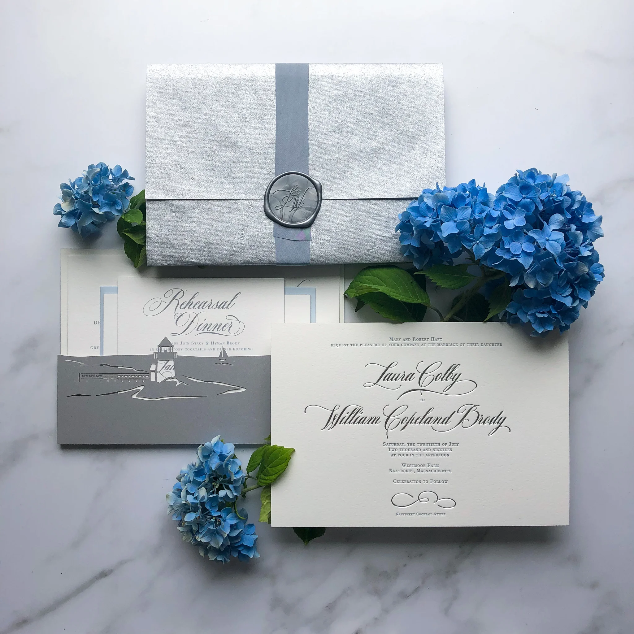 TypeAInvitations_TrendingWeddingColorPalettes_MetallicShimmer_Nantucket_SilverBlue_Wedding_FormalInvitation_SilverFoilStamping_LaserCutPocketBacking_Hydrangeas.jpg
