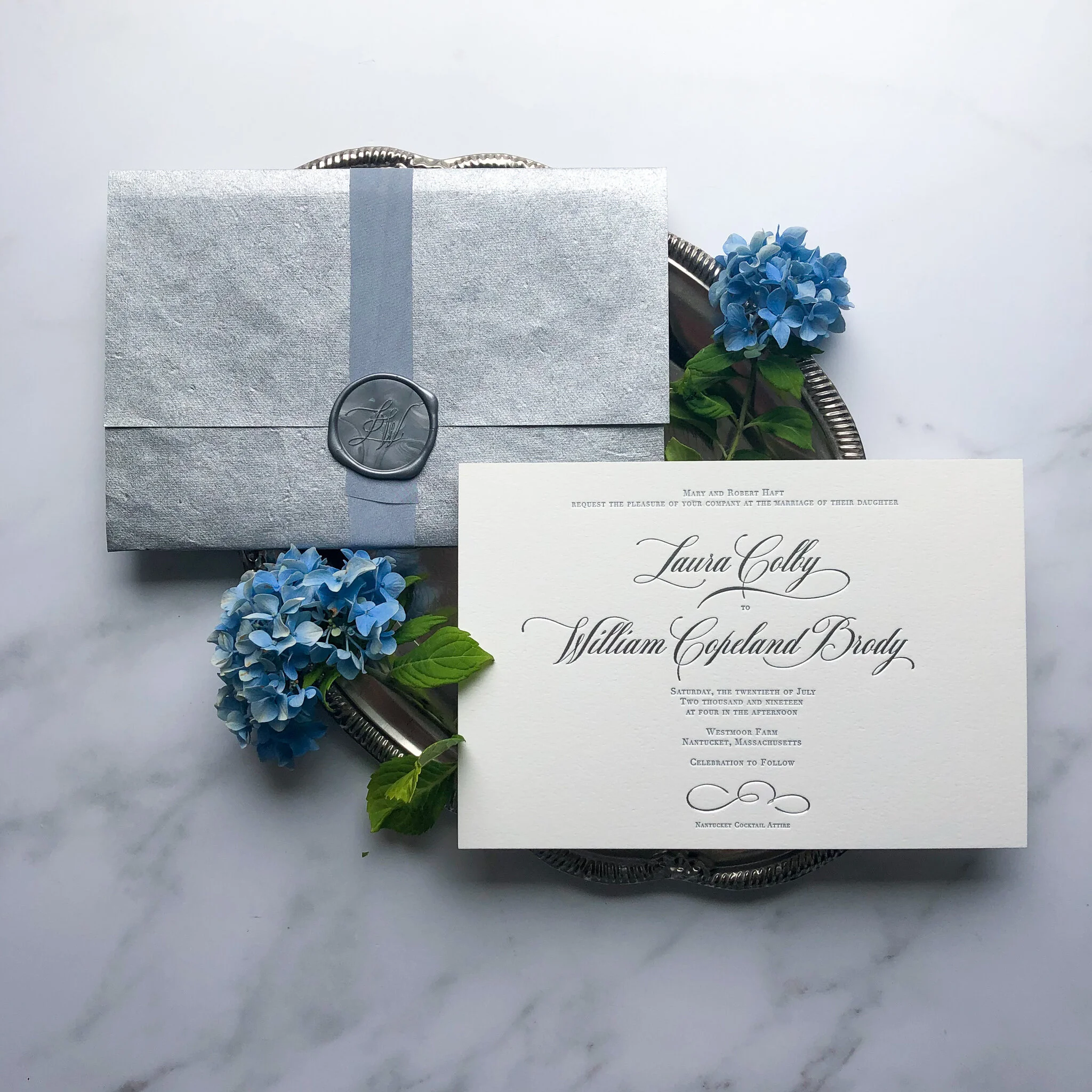 TypeAInvitations_Nantucket_SilverBlue_Wedding_InvitationsSuite_SilverFoilSTamping_MonogramWaxSeal_BlueRibbon.jpg