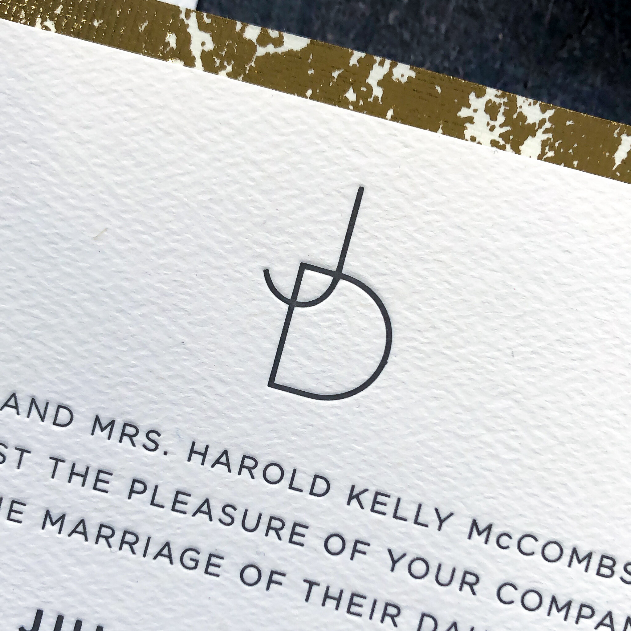 TypeA-Invitations_TheJulia_MinimalMonodernWeddingInvitationSuite_CustomMonogram_Simple_Letterpress_CloseUp.jpg