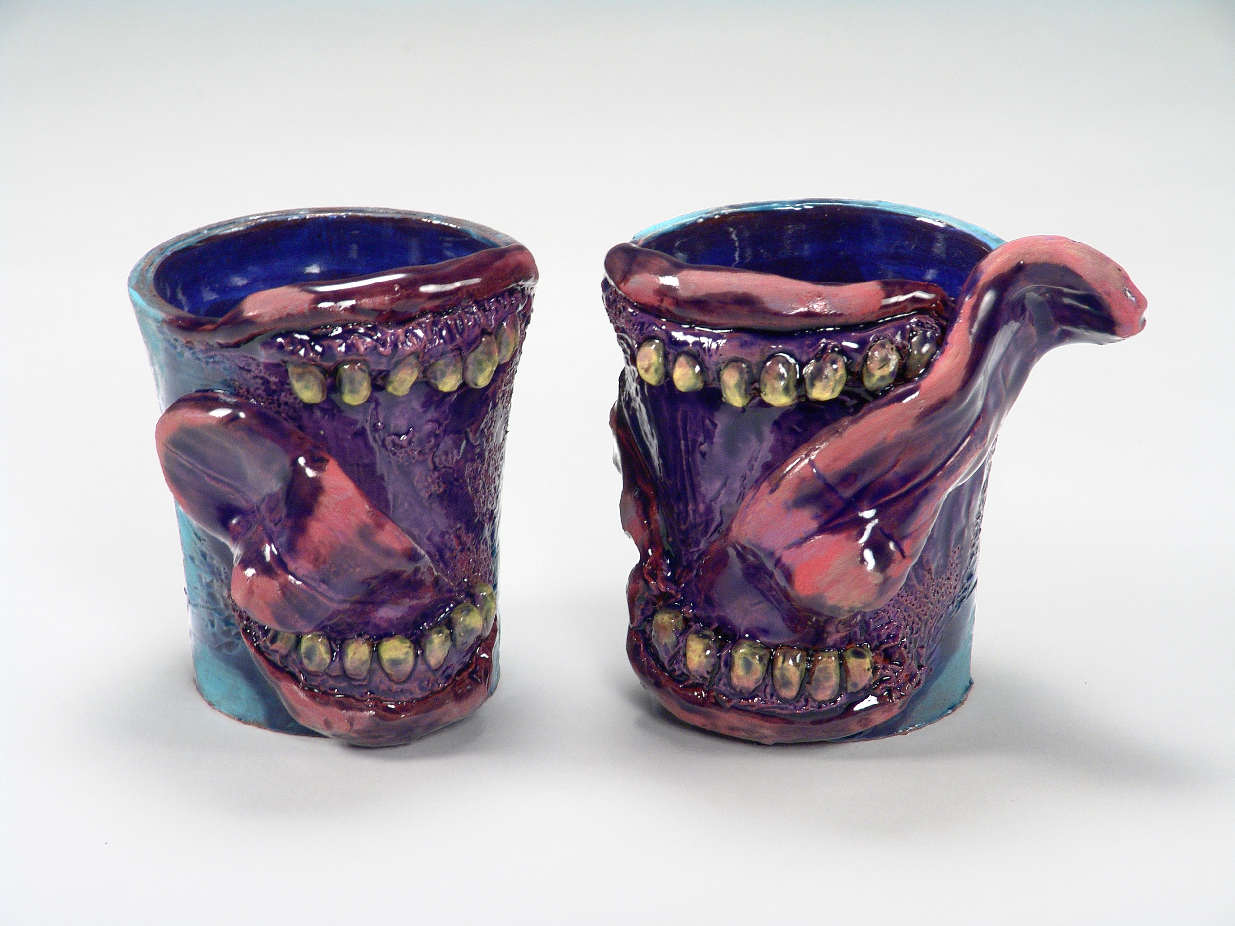 Mouth to Mouth, 4''x5'', Ceramic mugs, 2014 Photo by Mitzi Davis
