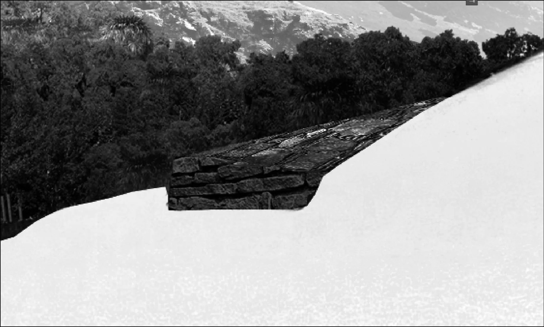 Here is a detail of the low wall with snow around it.