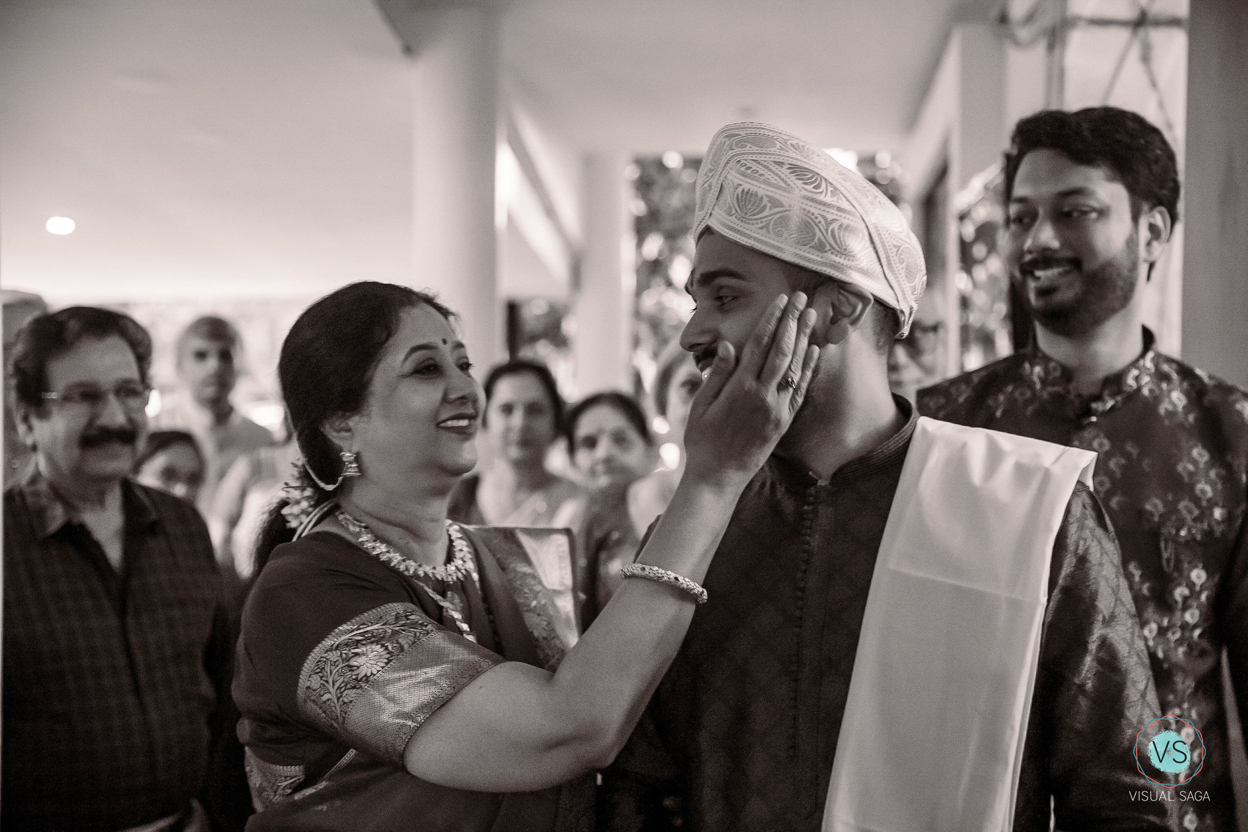 Visual Saga - best wedding photographers in bangalore and pune - emotional moment between groom and brides mom.jpg