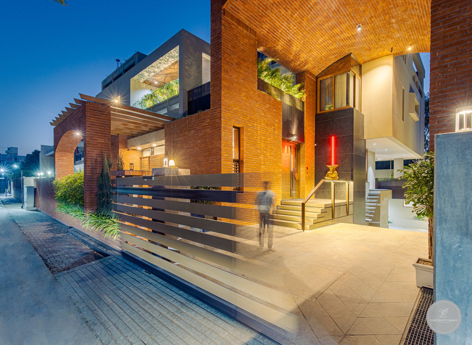 best interior photographer in pune bangalore - exposed brick facade for a bungalow in evening sunset light.jpg