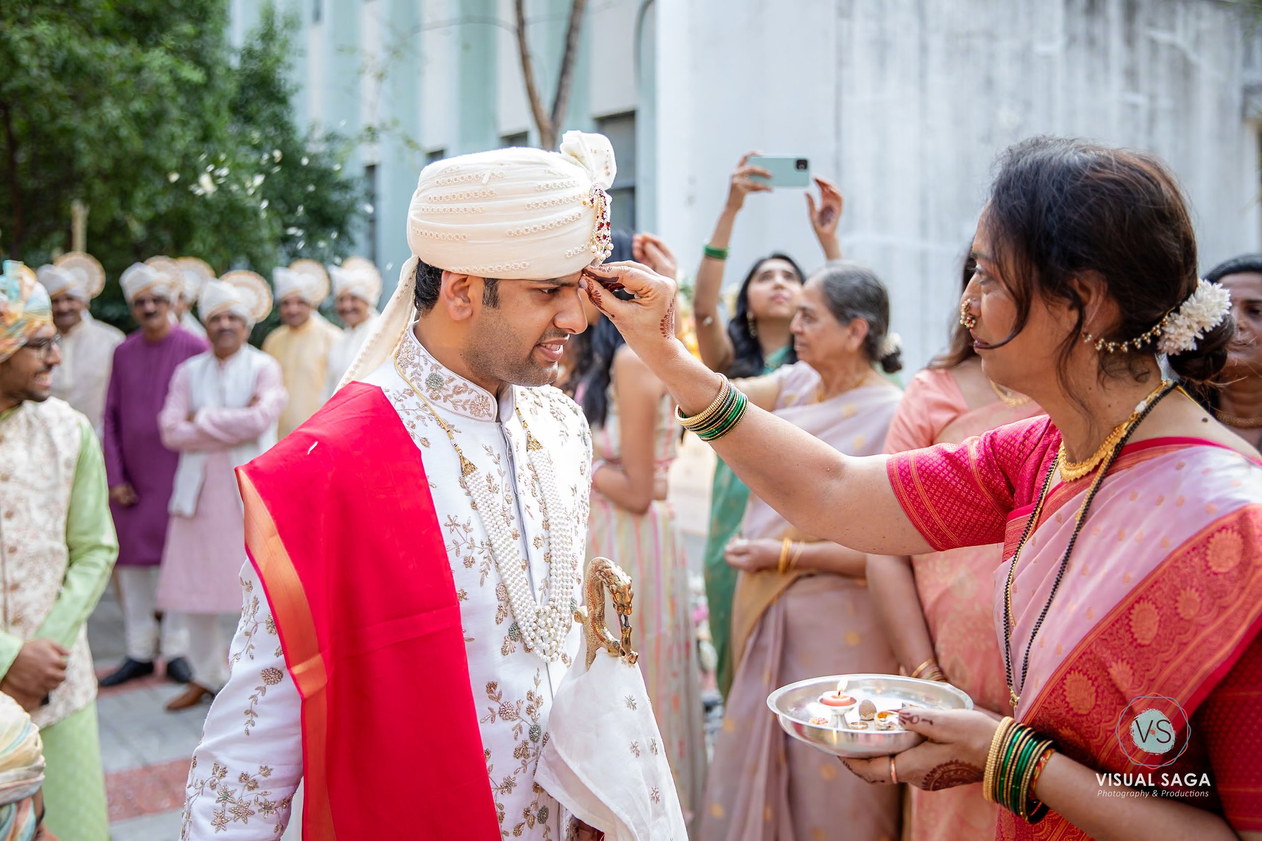 best-wedding-photographer-in-pune-groom-welcomed-by-brides-mom.jpg