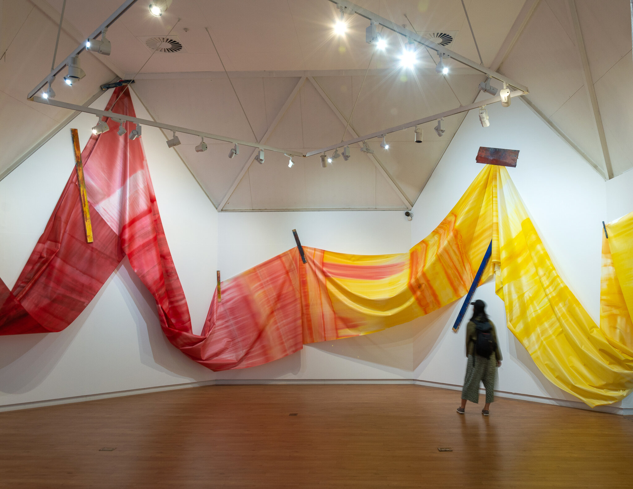   Recto / Verso  2020  acrylic pigment solution on knitted polyester fixed with wood  50m in length Hastings City Art Gallery 