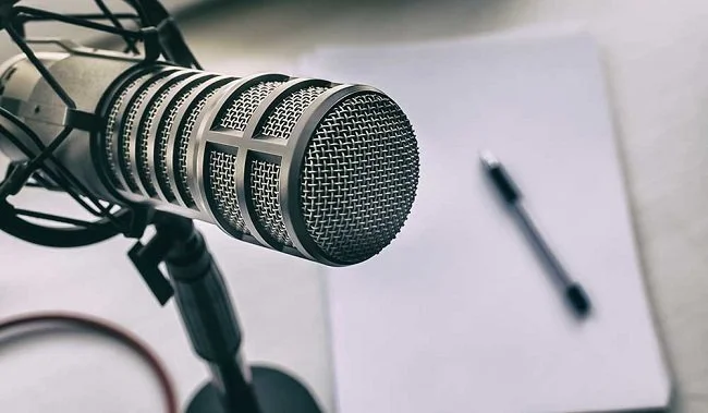 Podcast Mic and Shownotes.jpg