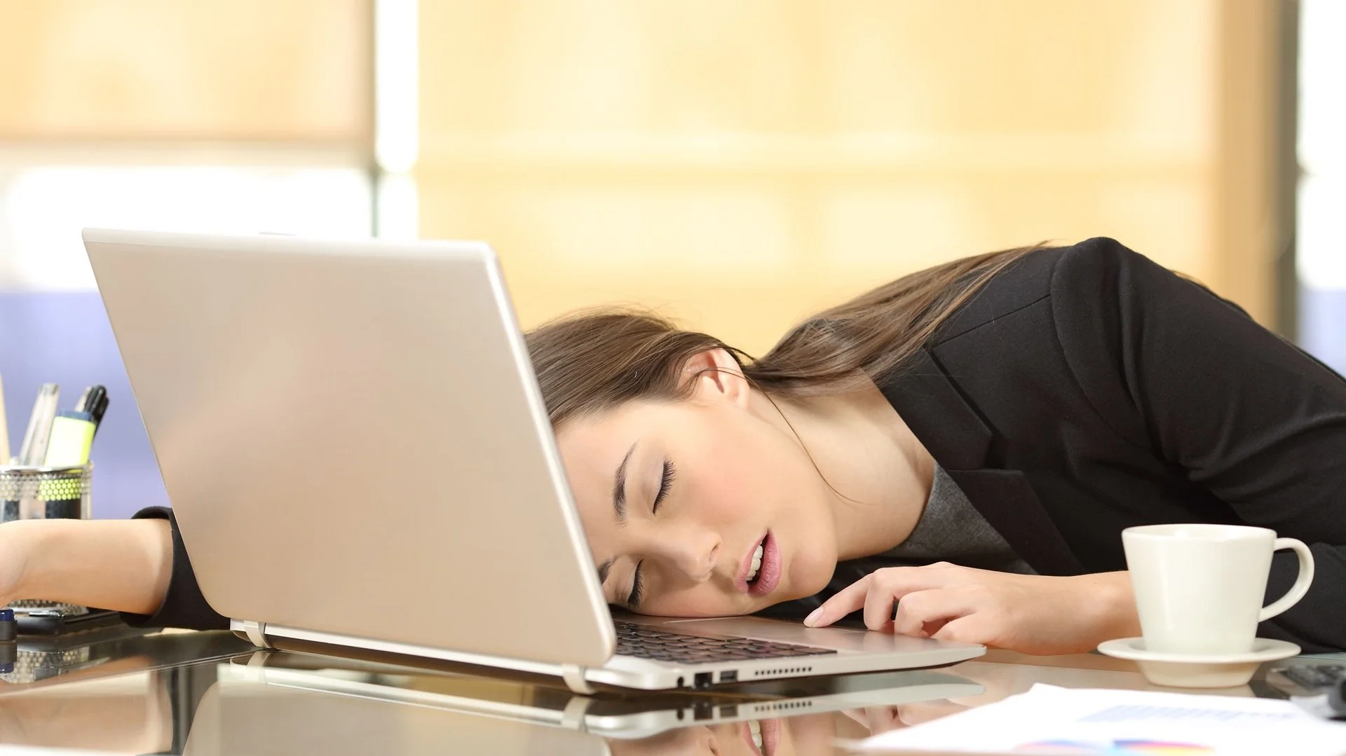 Woman Asleep at Work