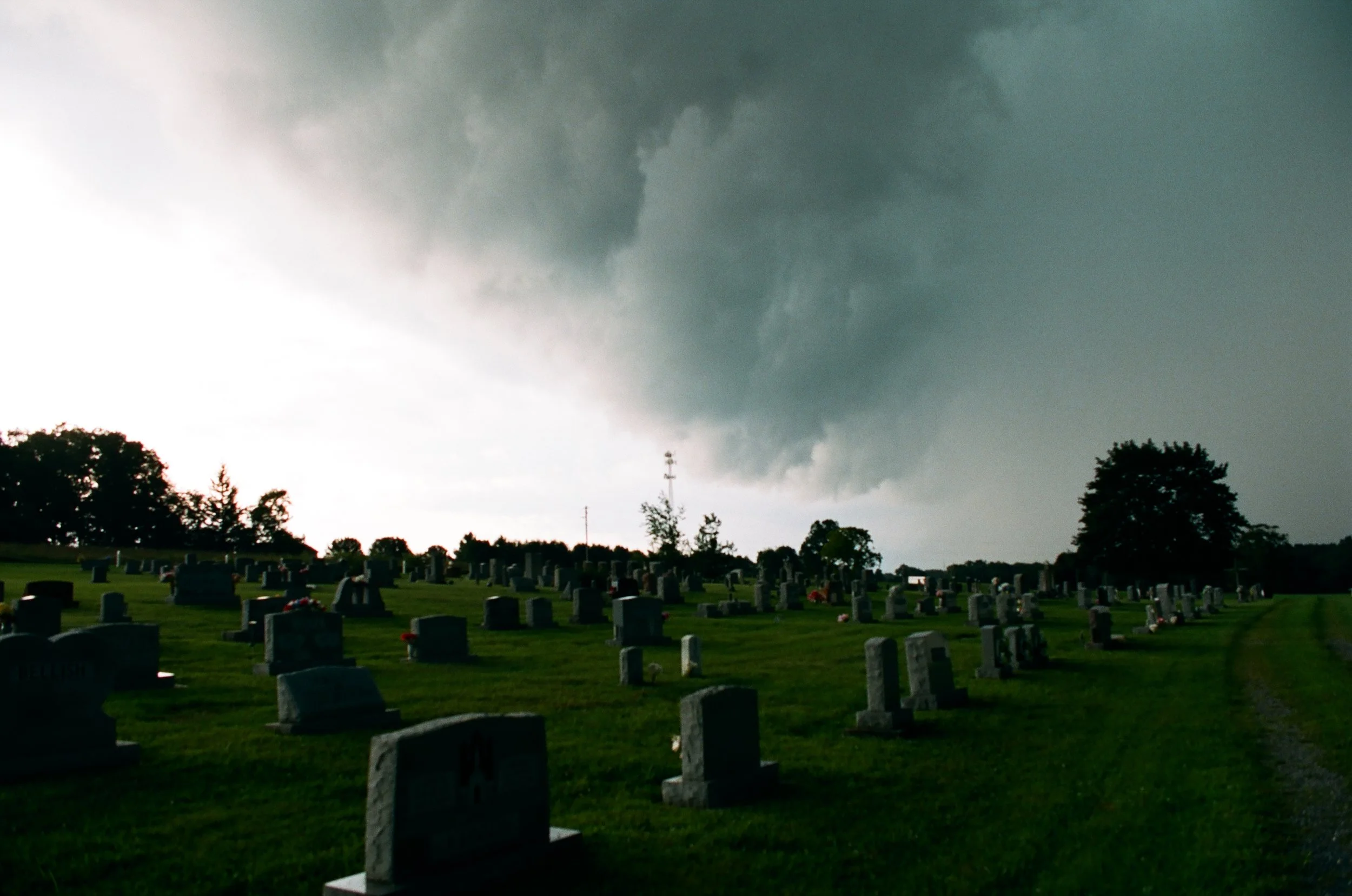 Shelf cloud at the edge of the precipitation just before strongest storm winds over cemetery on Kodak Portra 400
