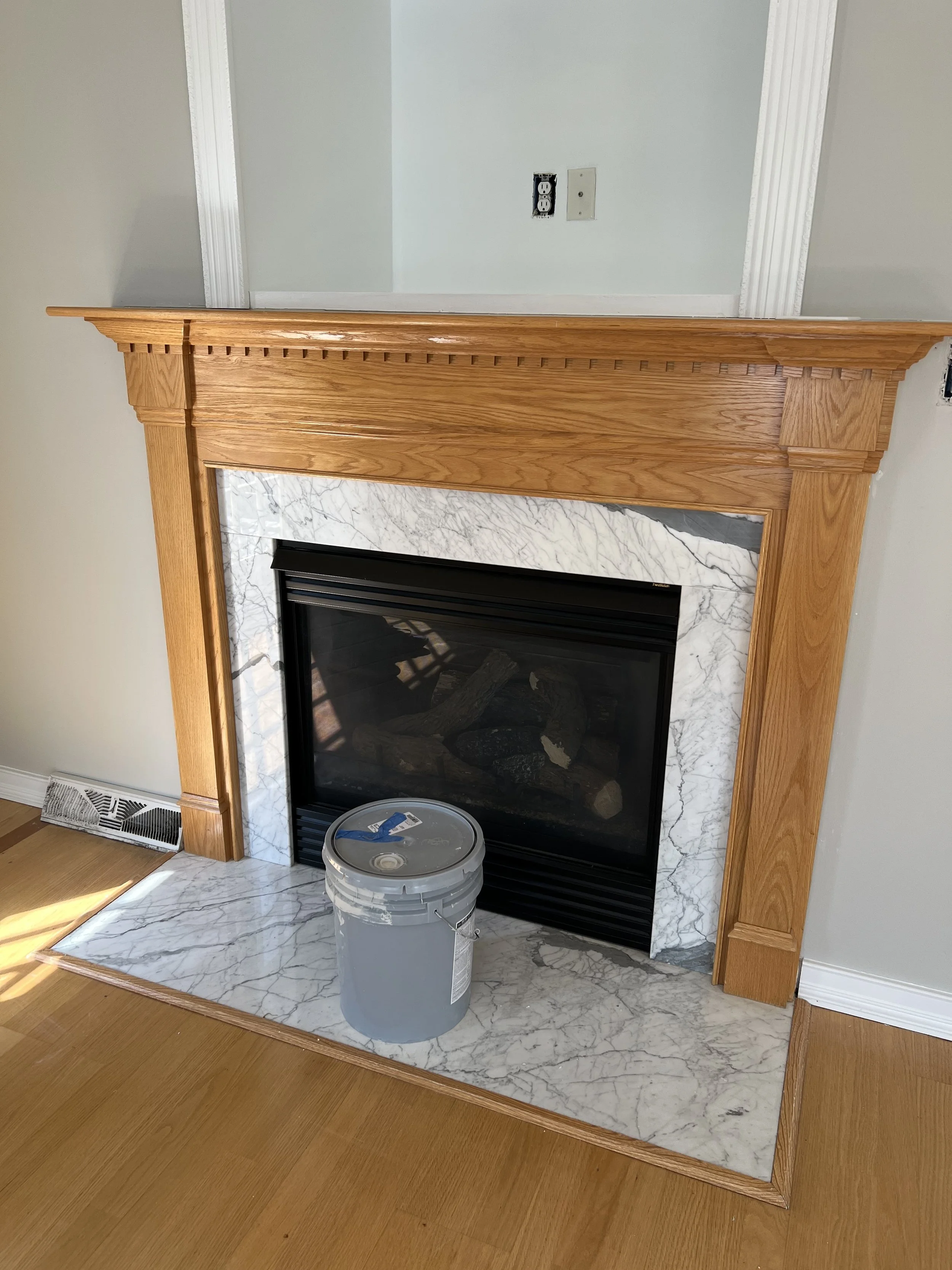 Painted fireplace mantle before and after, Columbia MD home