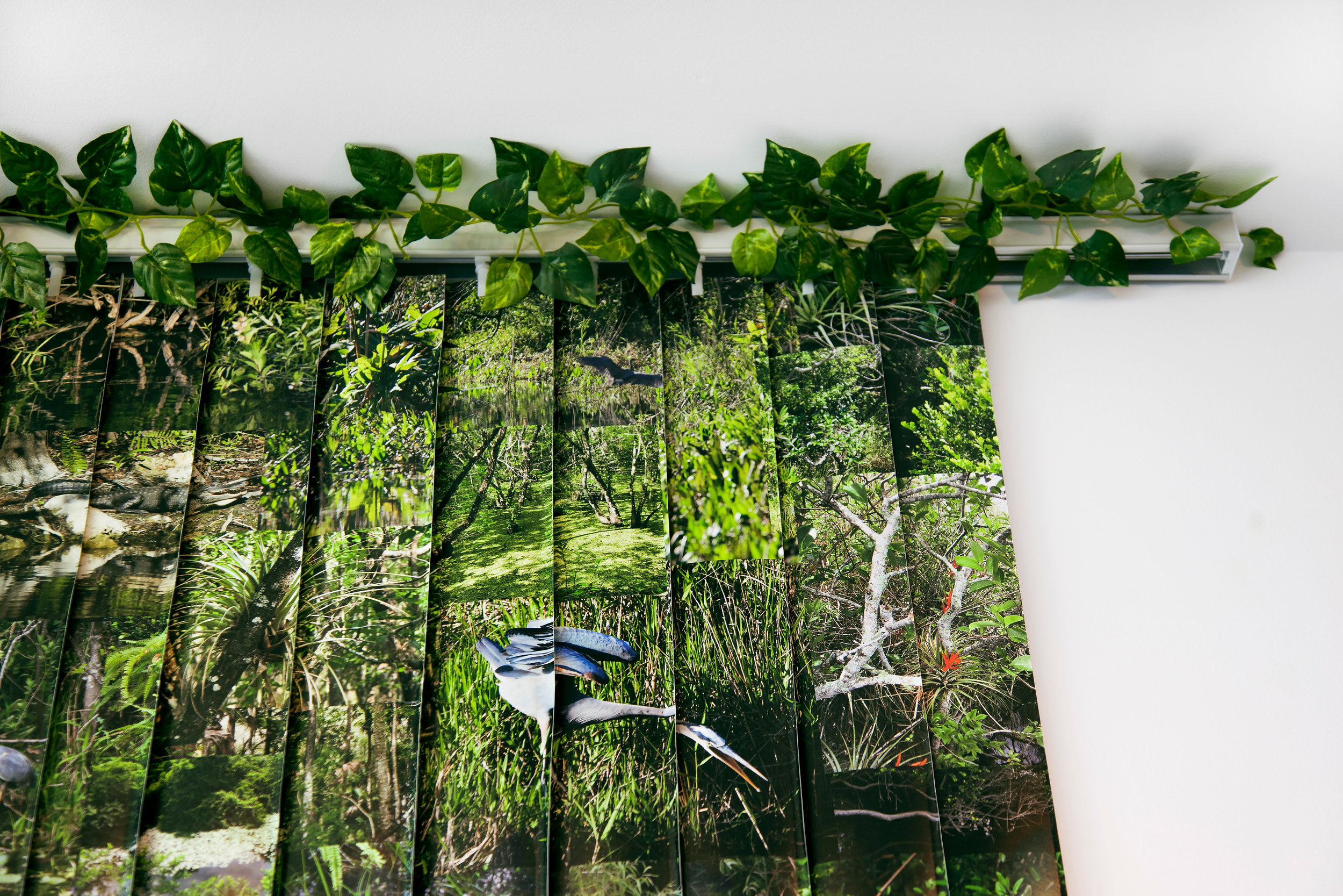 Everglades , detail, 2014, vinyl wallpaper, vertical blind, artificial vines, 78"x 84" (198.1 cm x 213.4 cm)