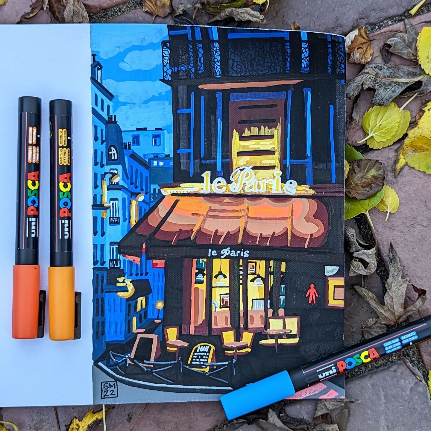 Moody fall colors in a quiet nighttime Parisian scene 🍂