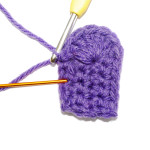 Slip stitch (pull it tight to really get that curve). Now work another 6 trebles in the stitch hole shown here