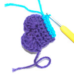 Cast on your new colour. Chain 1 (counts as 1st double) and then work 1 double into next 5 stitches (6 in total)