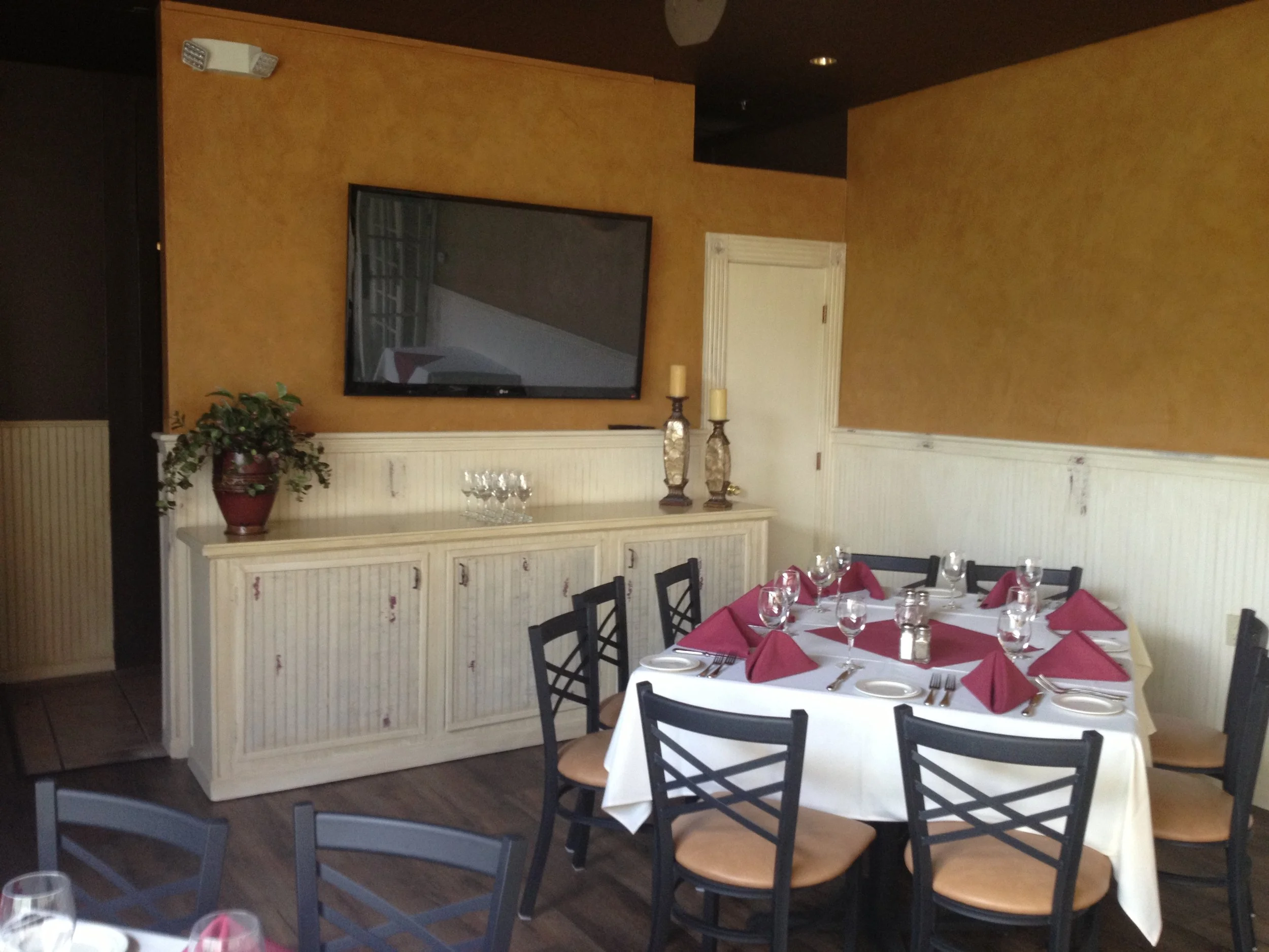  After - chair rail painted &amp; distressed, low trim removed, venetian plaster walls, new lighting, new chairs, new floors. 