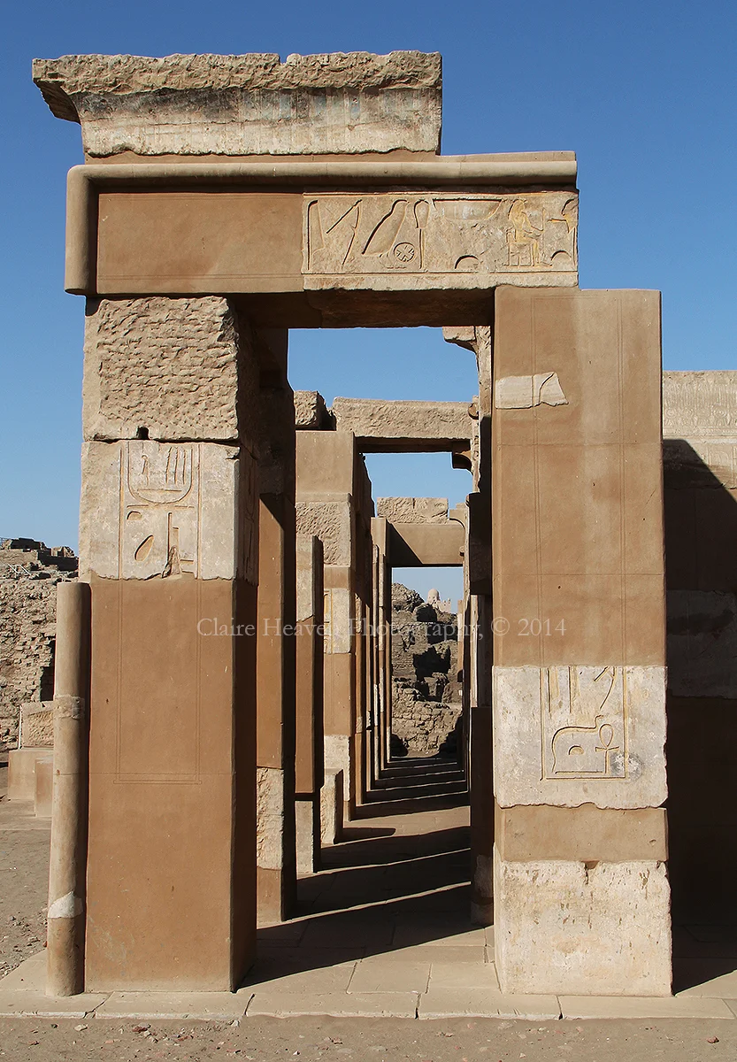 A doorway of shadows and light