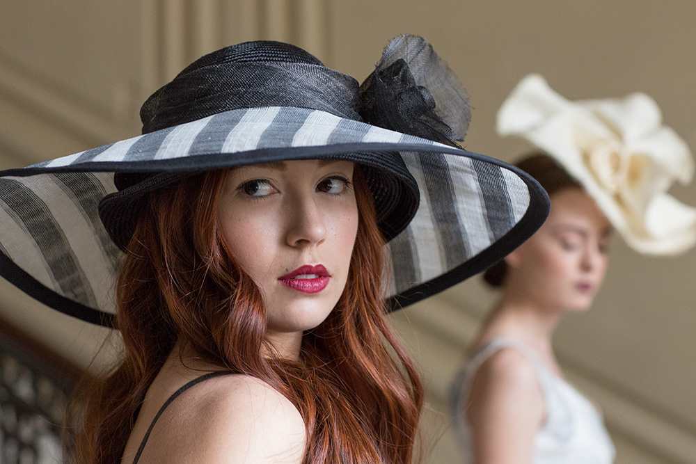 Amina's hats for the Derby Party at the Kansas City Museum. Foreground: Black and White Striped Sinamay Oversize Double Brim
