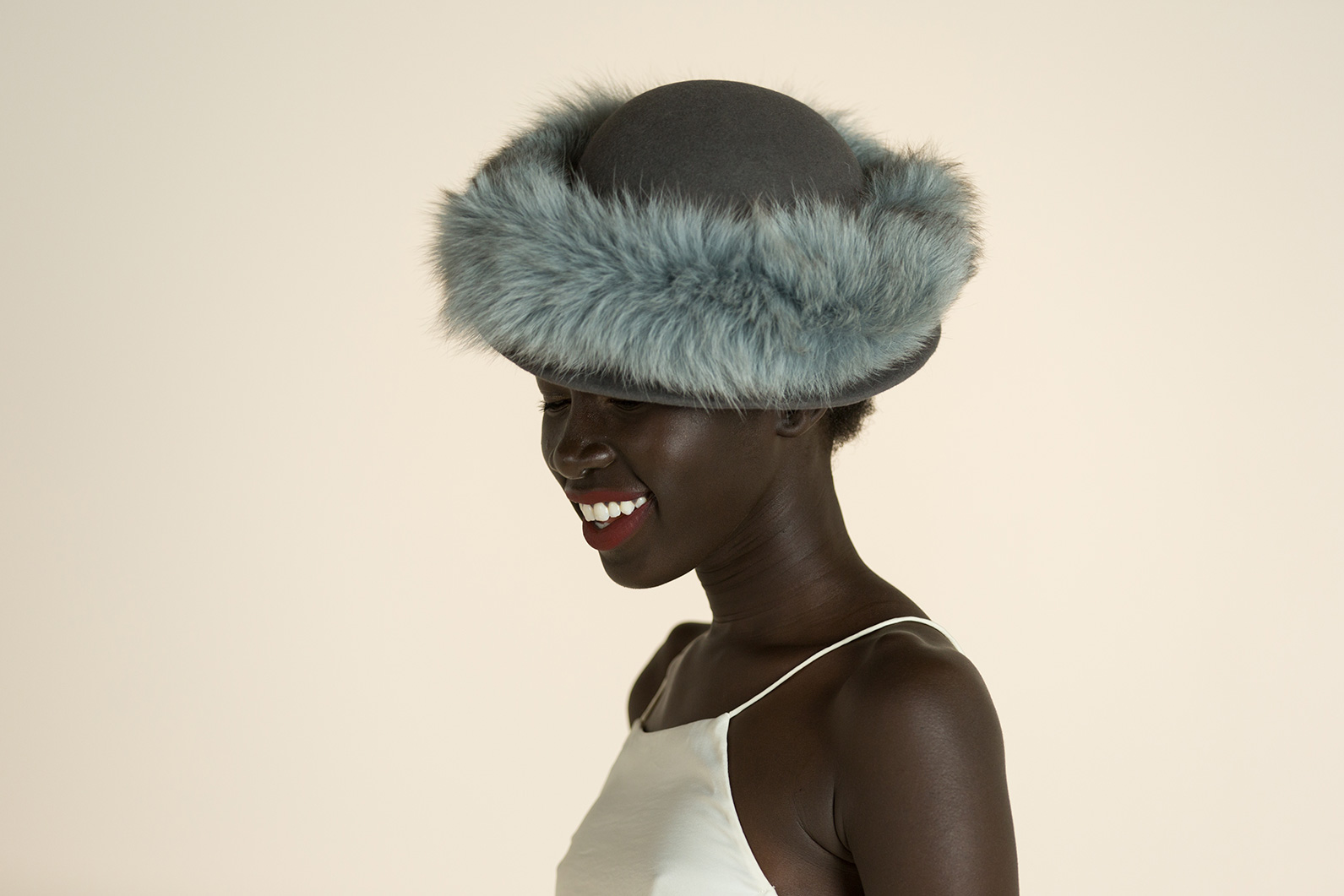 Fur felt hat with fox trim.