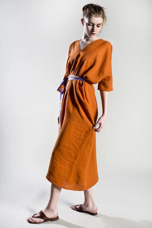 Our Orange Irish Linen Lounge Dress comes with a vintage Japanese tie-dyed sash to wear around your waist or neck. It’s the ultimate relaxed summer dress. $795