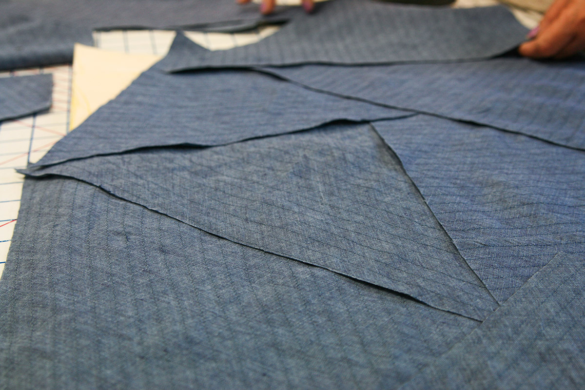 Any exposed raw edge is a bias cut piece so that it will have the correct direction of “fray.”