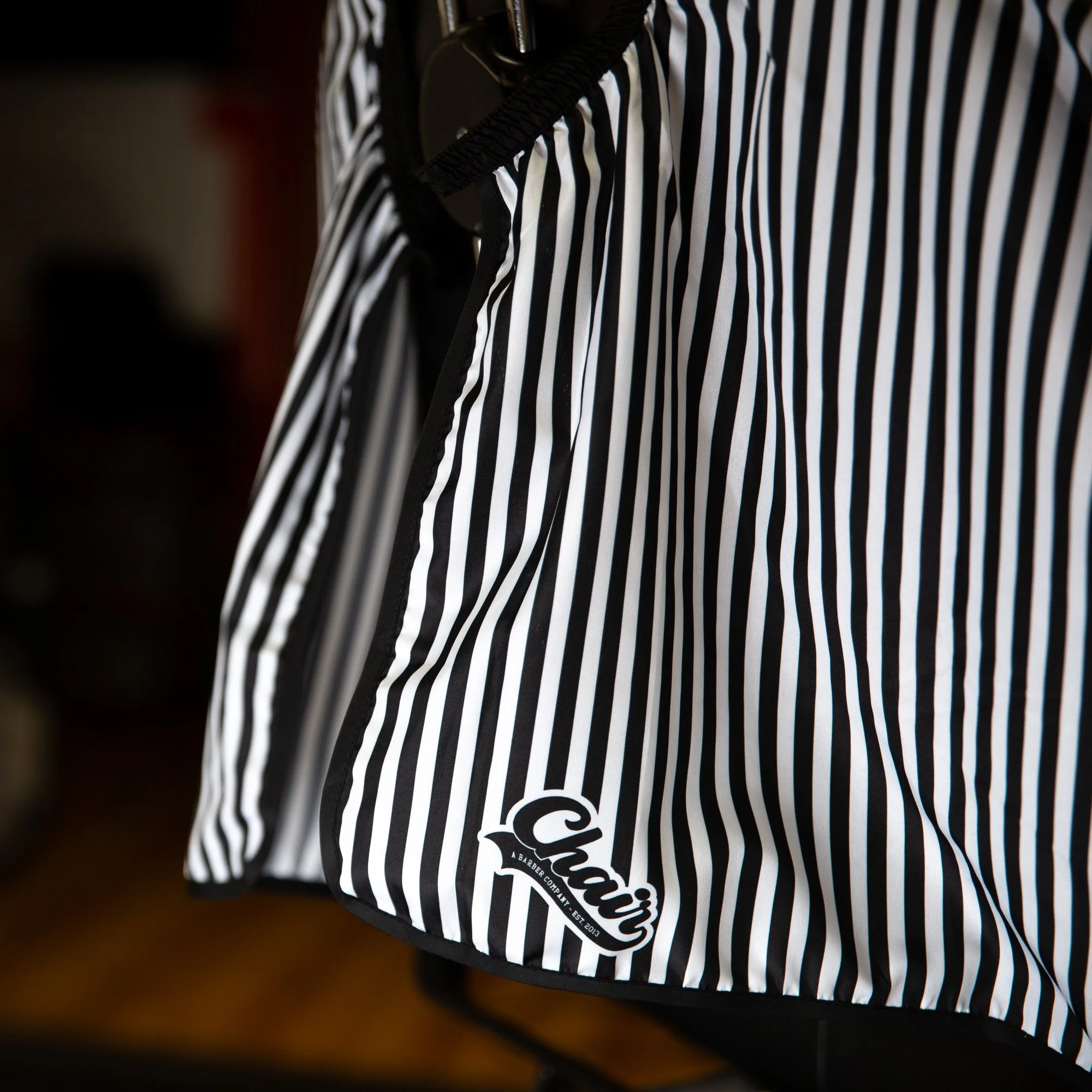 barber-cape-black-white-pinstripe-elastic-neck-7.jpg