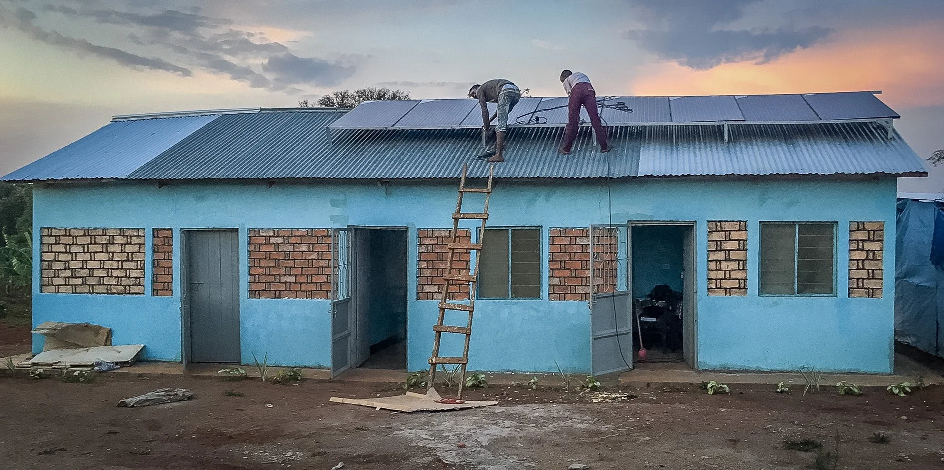 Solar panel installation on the roof of the main building on the site (Rauscher Hall) will provide the energy to run the well pump as well as electricity for the building.