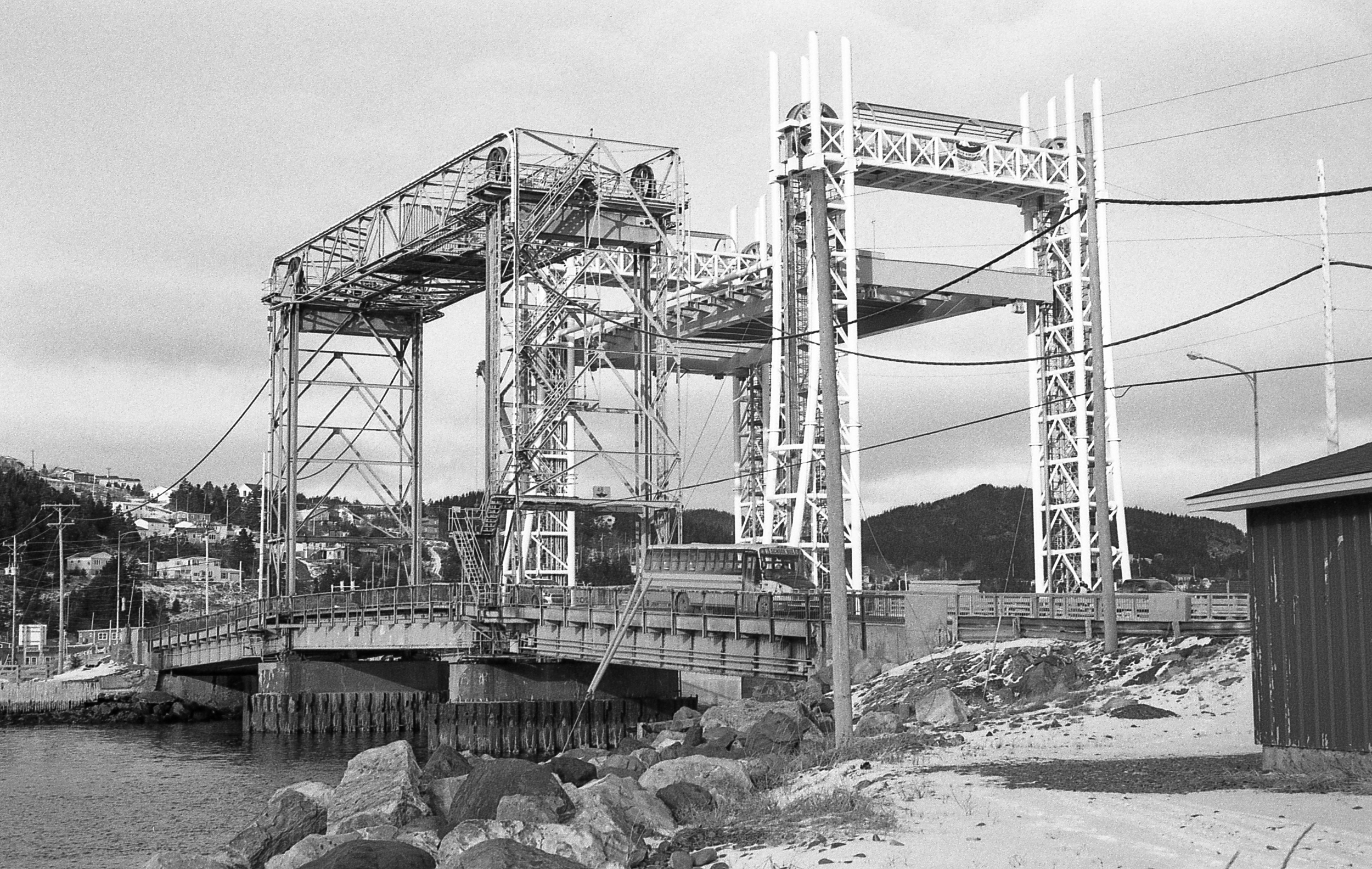 Entrance to Placentia Harbour. The original lift bridge, opened in 1961, stands next to its almost ready modern replacement.