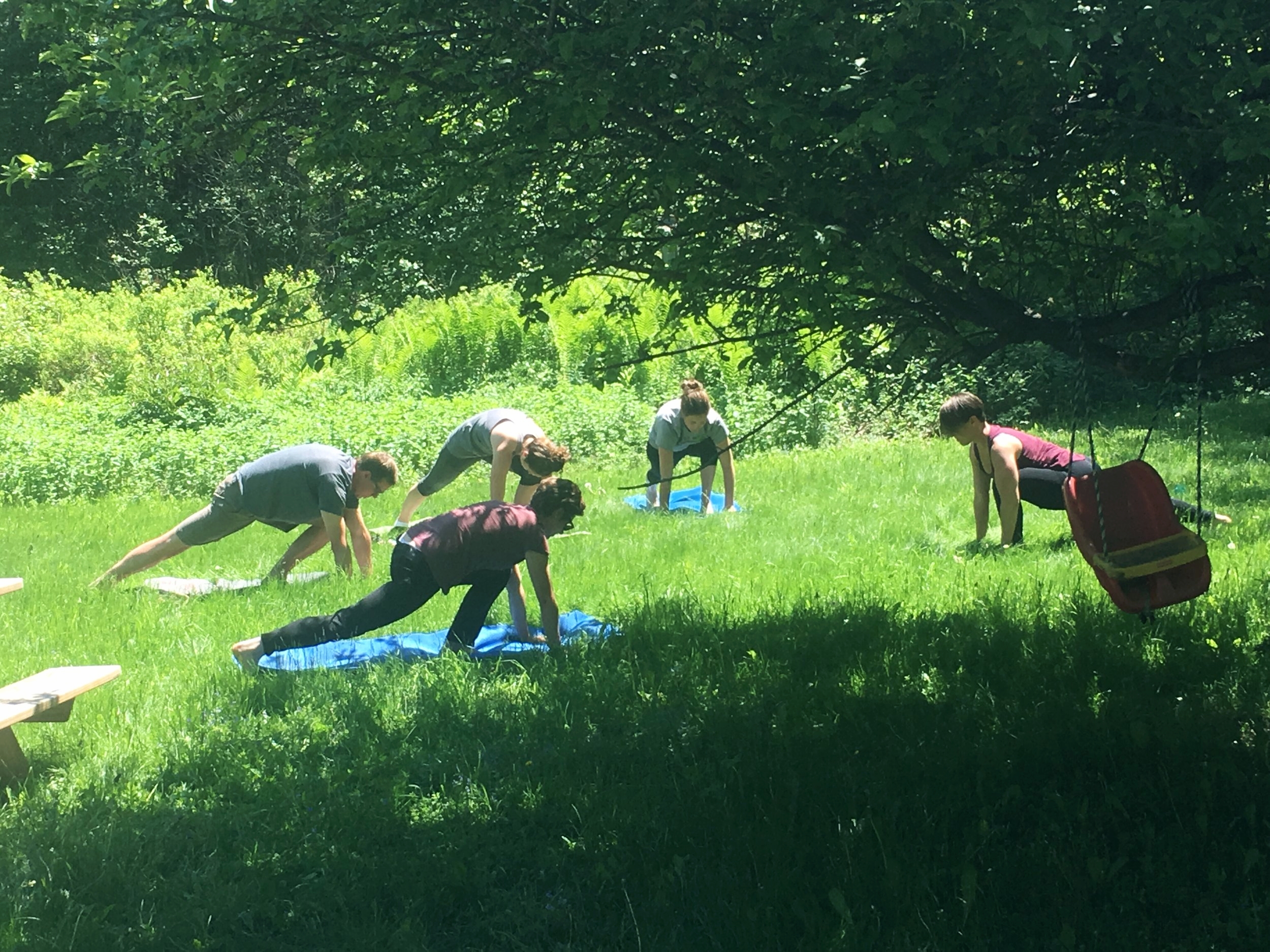 We always make time for movement. Here are some of us stretching in a mini-yoga session.